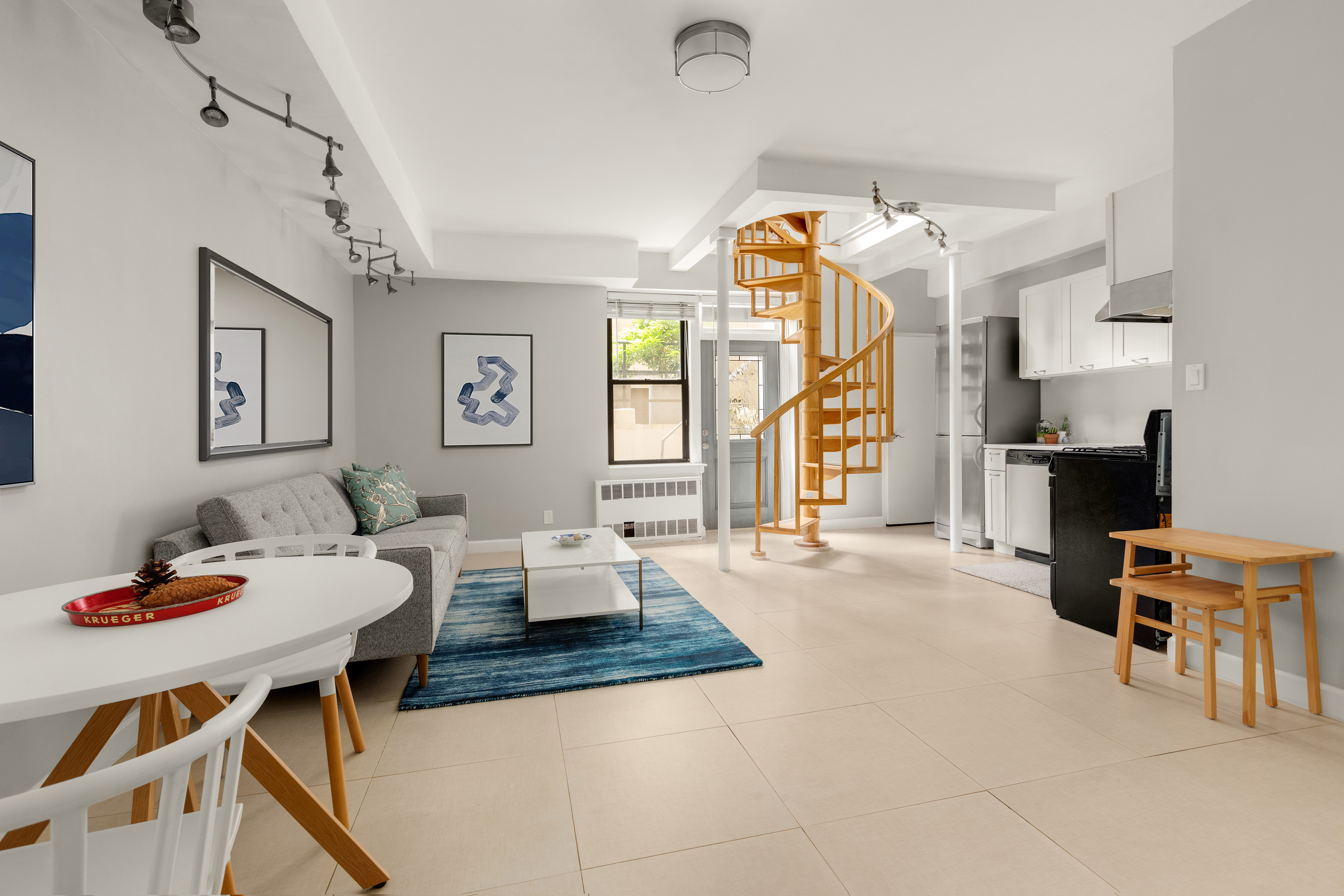 a living room with furniture and a table