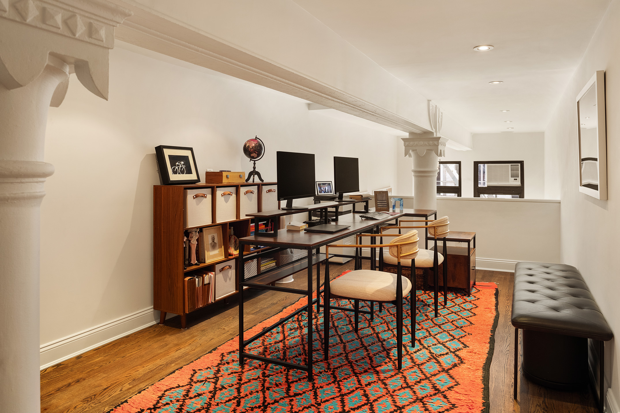 250 Mercer Street, Unit C302 Manhattan, NY 10012 - Photo 13 of 24 a view of a livingroom with furniture and a flat screen tv