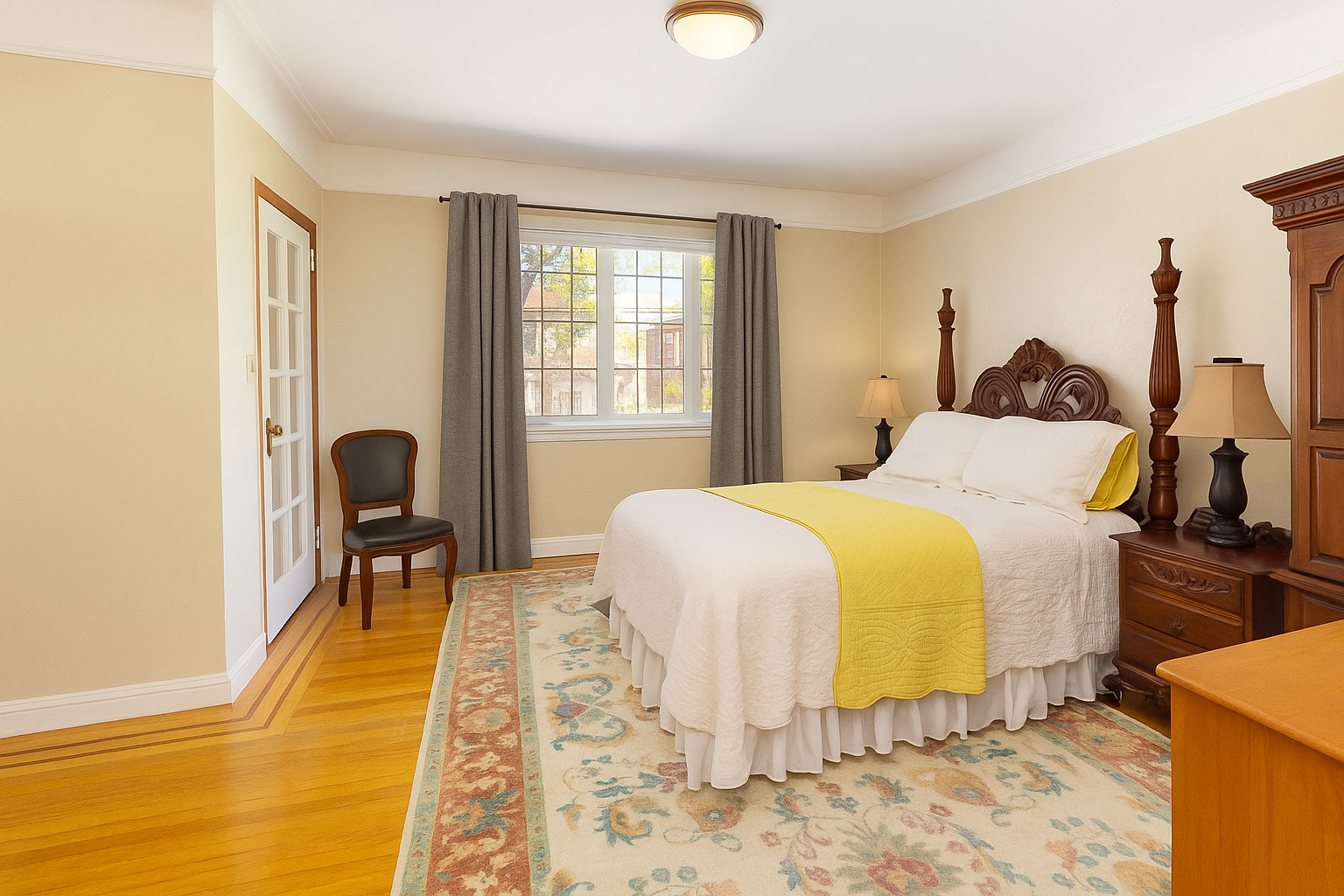 4167 Bruner Avenue Bronx, NY 10466 - Photo 7 of 16 a bedroom with a bed and wooden floor