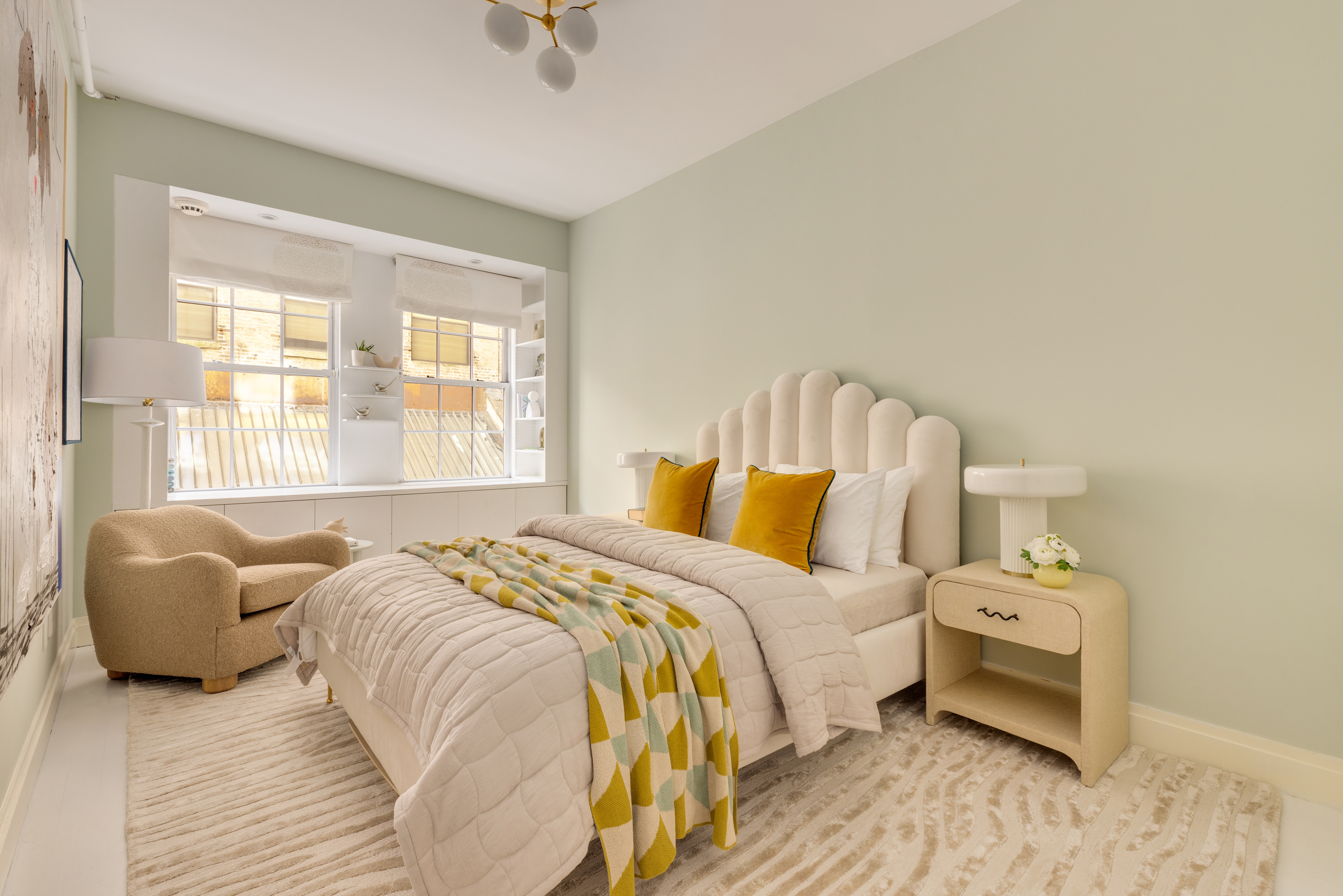 18 Leonard Street, Unit 2D Manhattan, NY 10013 - Photo 17 of 22 a bedroom with a bed and a couch