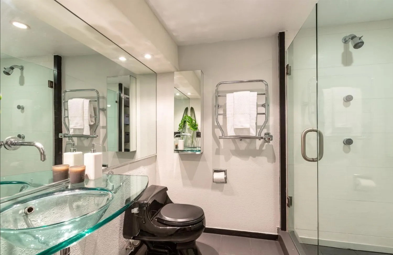 a bathroom with a sink and mirror