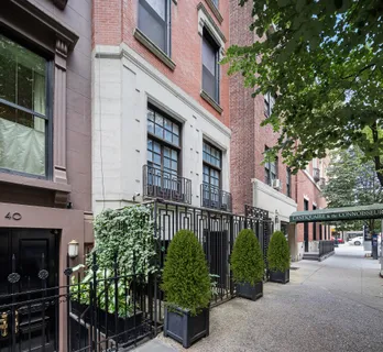 a picture of a bathroom with a shower