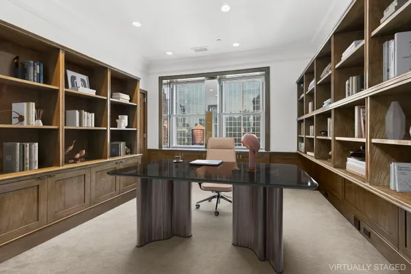 a view of a workspace with furniture