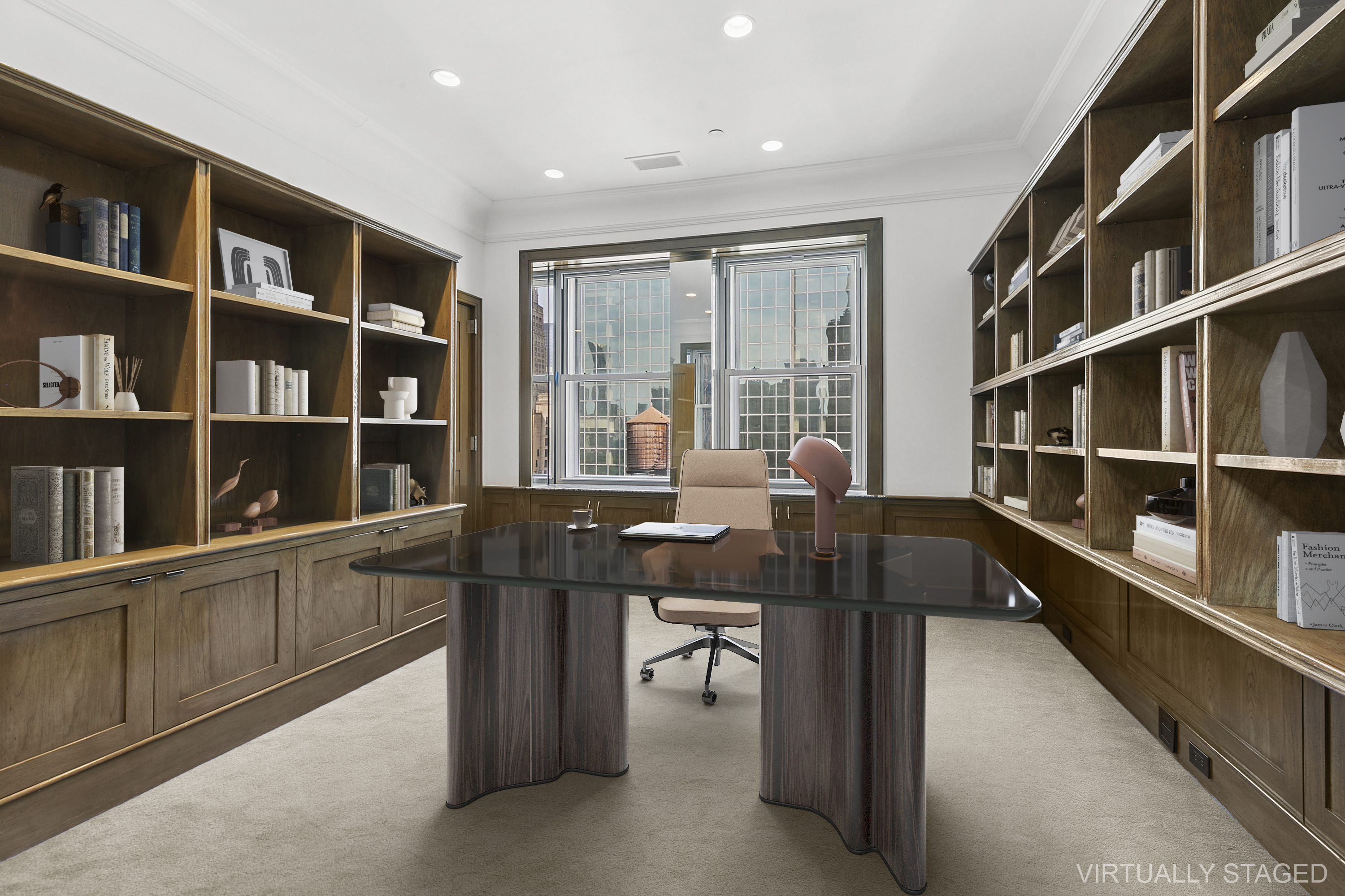 781 5th Avenue Manhattan, NY 10022 - Photo 8 of 18 a view of a workspace with furniture