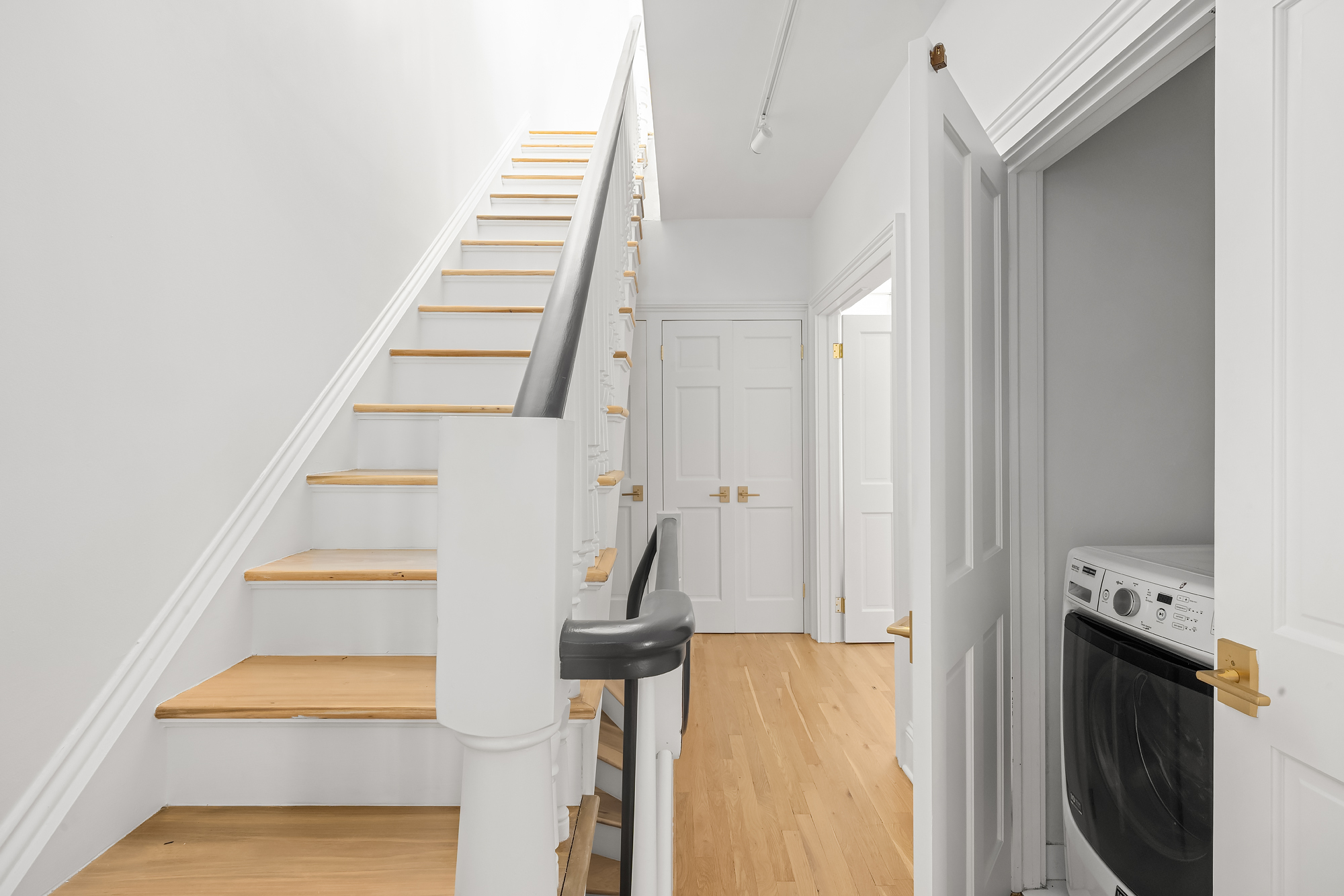 112 West 13th Street Manhattan, NY 10011 - Photo 45 of 46 a view of entryway and hall with wooden floor