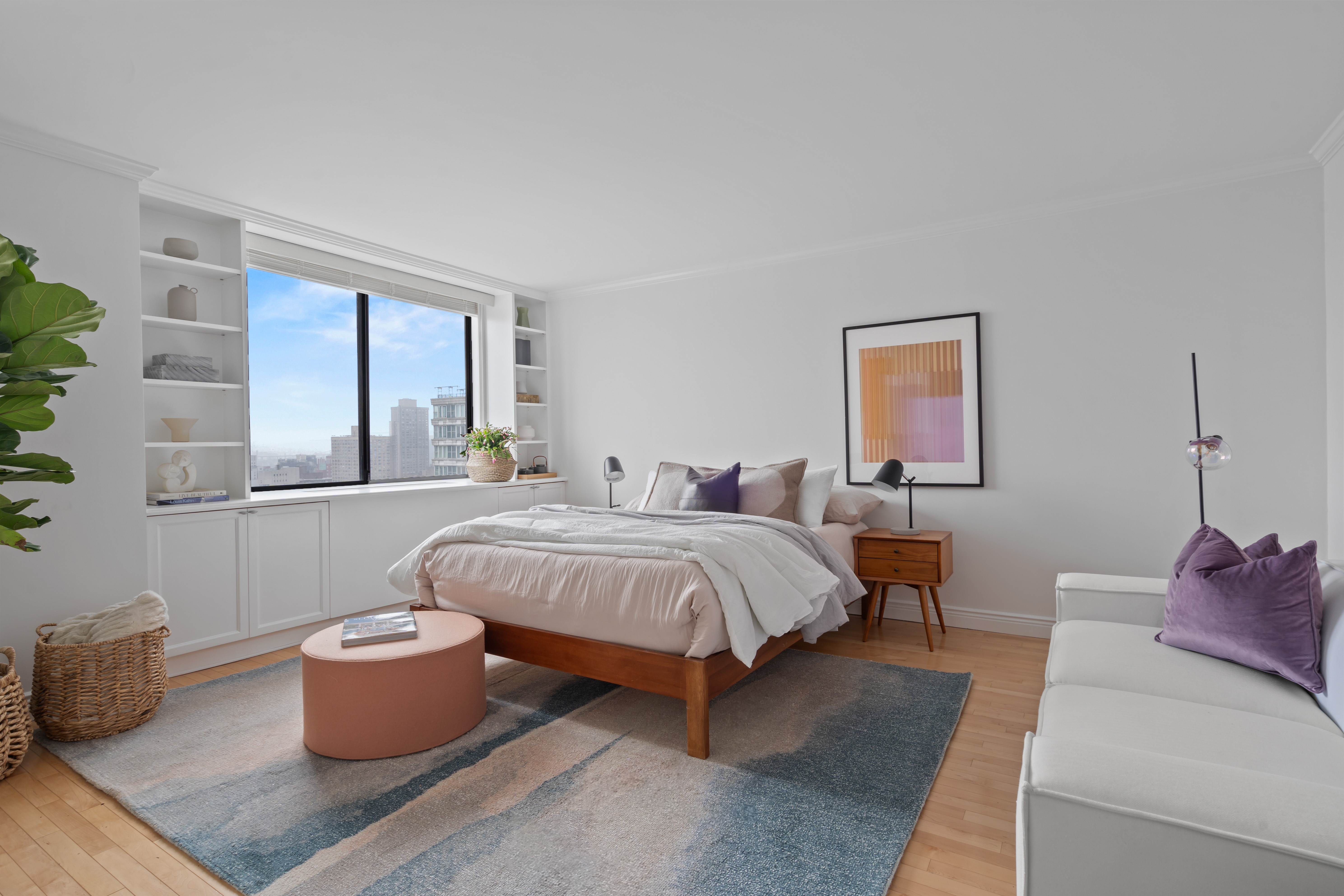 330 East 75th Street, Unit 32A Manhattan, NY 10021 - Photo 8 of 17 a spacious bedroom with a bed and window