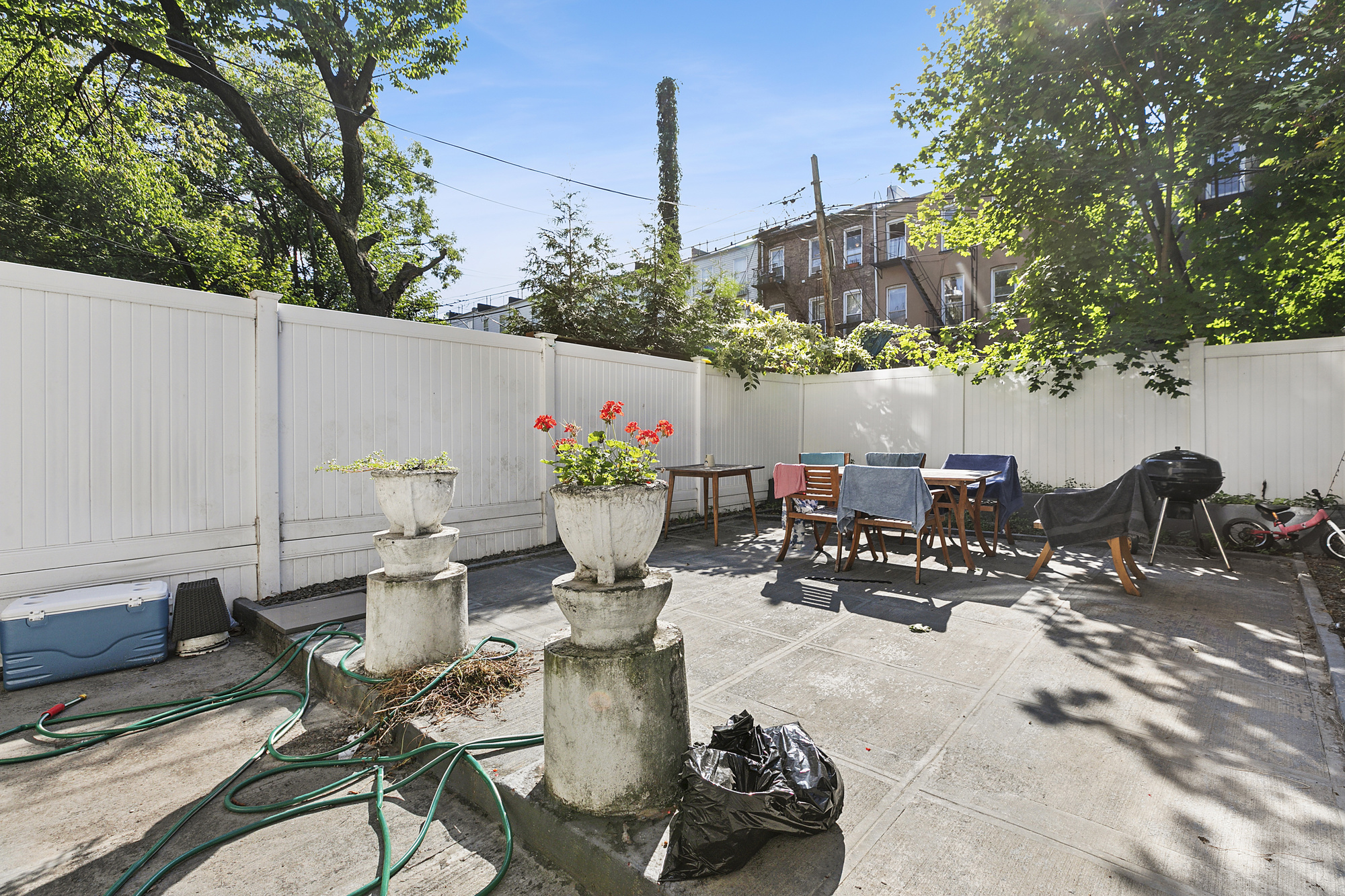 82 Clinton Avenue, Unit 1 Brooklyn, NY 11205 - Photo 2 of 11 a view of a chairs and tables in the patio