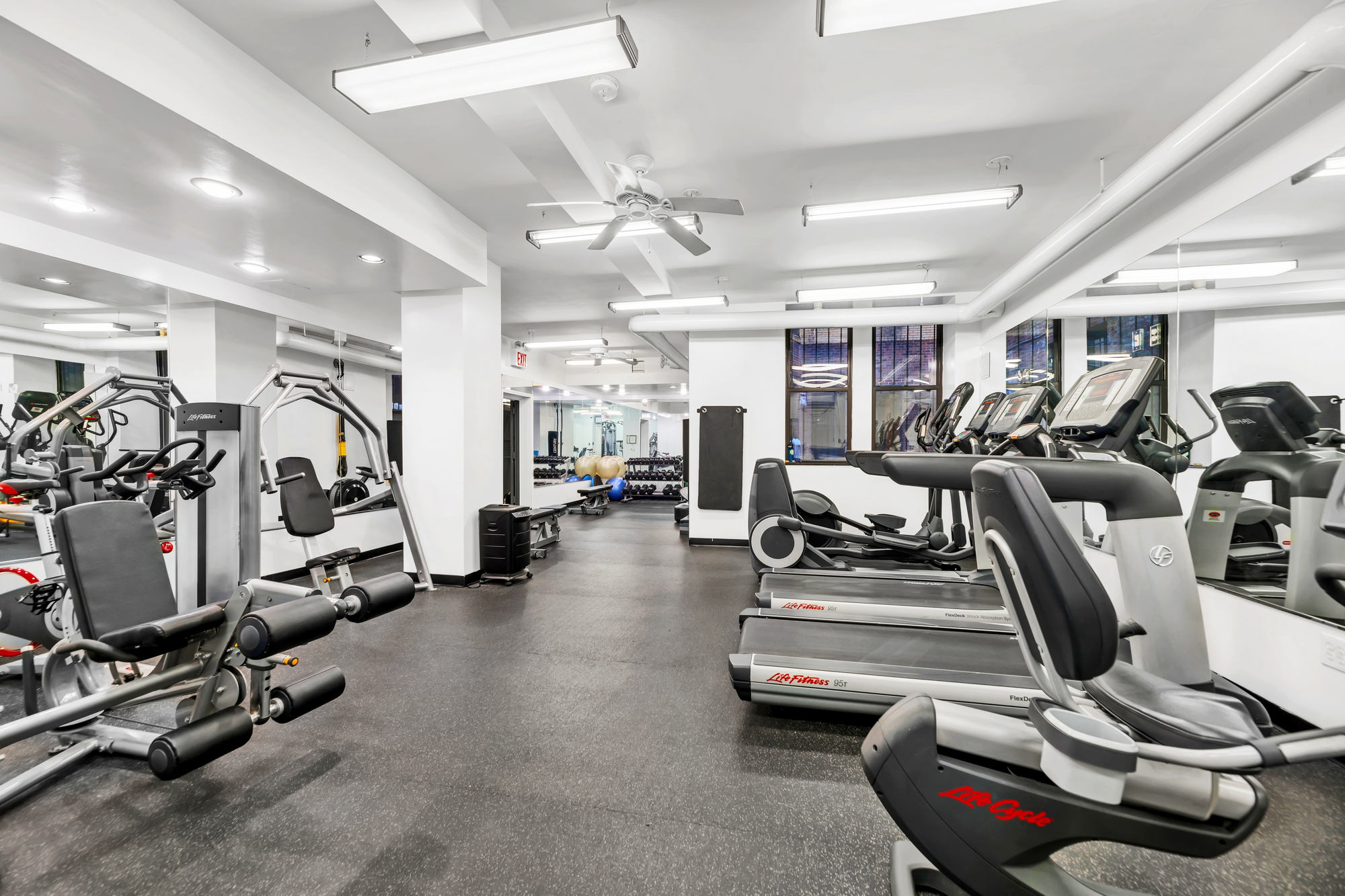545 West 111th Street, Unit 10G Manhattan, NY 10025 - Photo 8 of 12 a view of a room with gym equipment