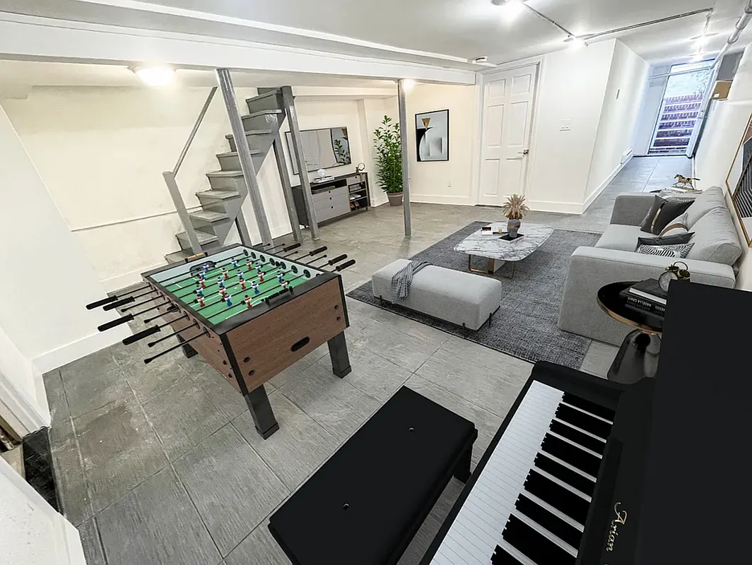 1128 Bushwick Avenue, Unit A Brooklyn, NY 11221 - Photo 4 of 14 a living room with furniture and a table