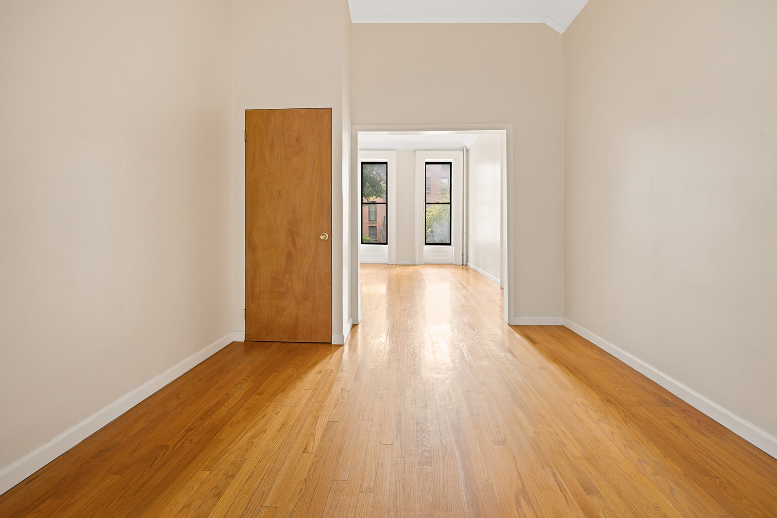 33 Park Place Brooklyn, NY 11217 - Photo 8 of 18 a view of a hallway with wooden floor
