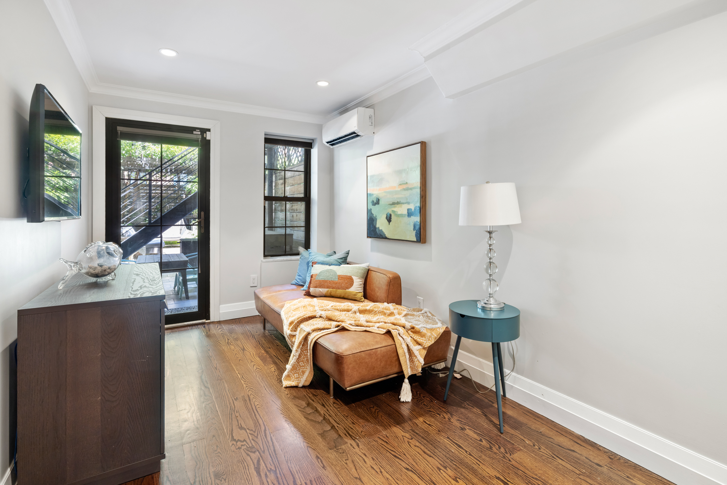 439 A Monroe Street Brooklyn, NY 11221 - Photo 21 of 29 a bedroom with a bed and wooden floor