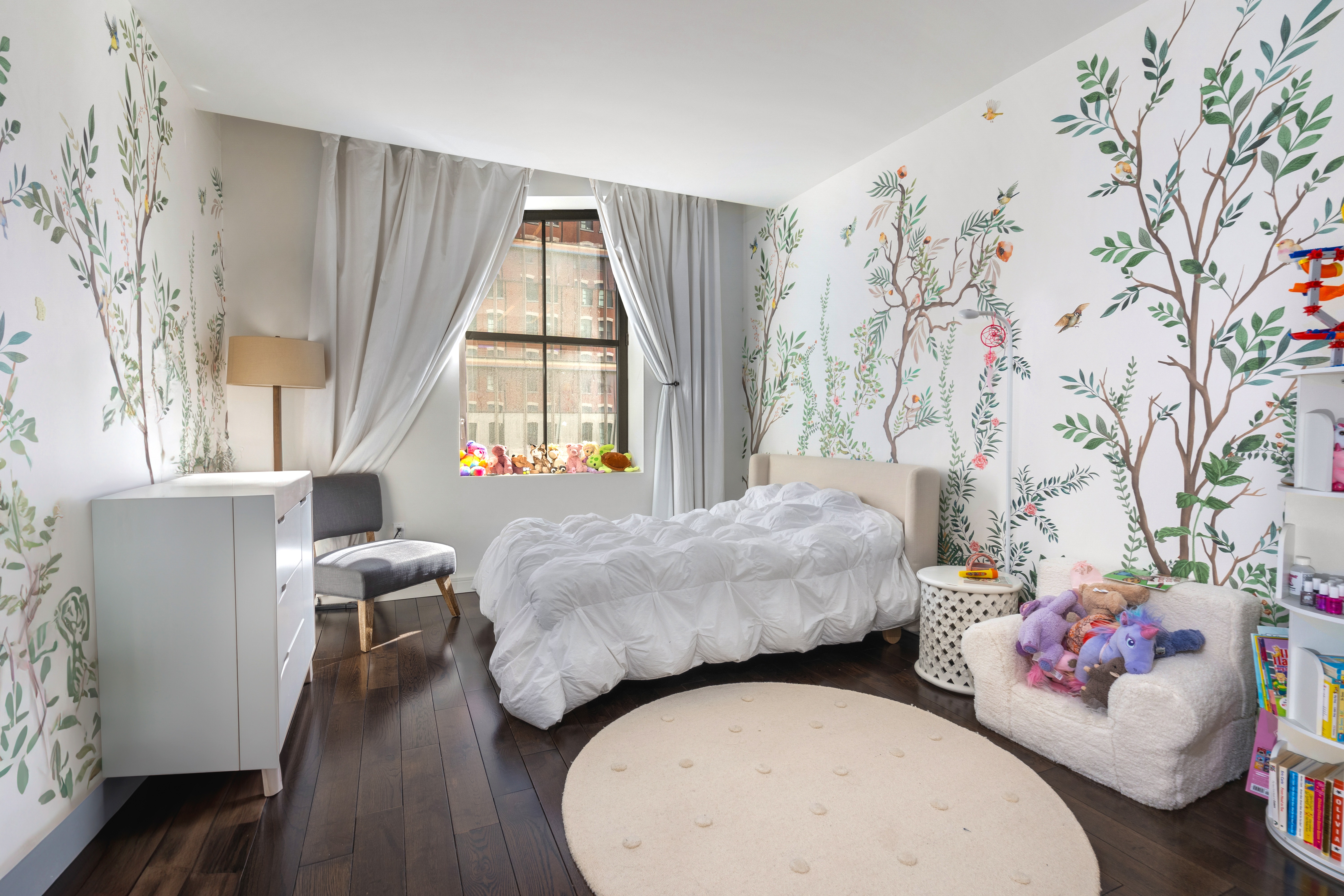 250 West Street, Unit 3F Manhattan, NY 10013 - Photo 5 of 11 a living room with furniture and a window