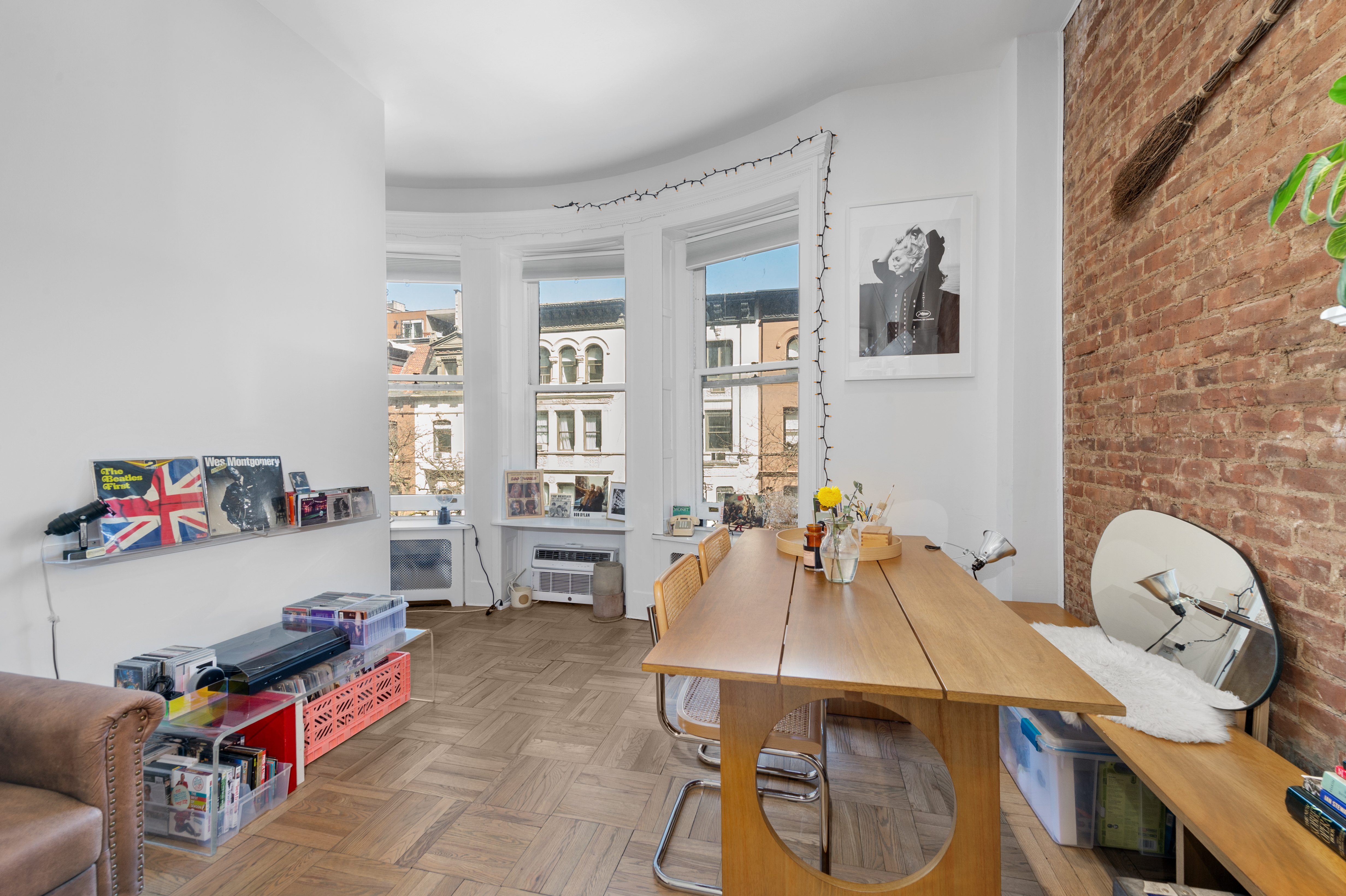 122 West 80th Street, Unit 3F Manhattan, NY 10024 - Photo 9 of 15 a view of a workspace with furniture and a potted plant