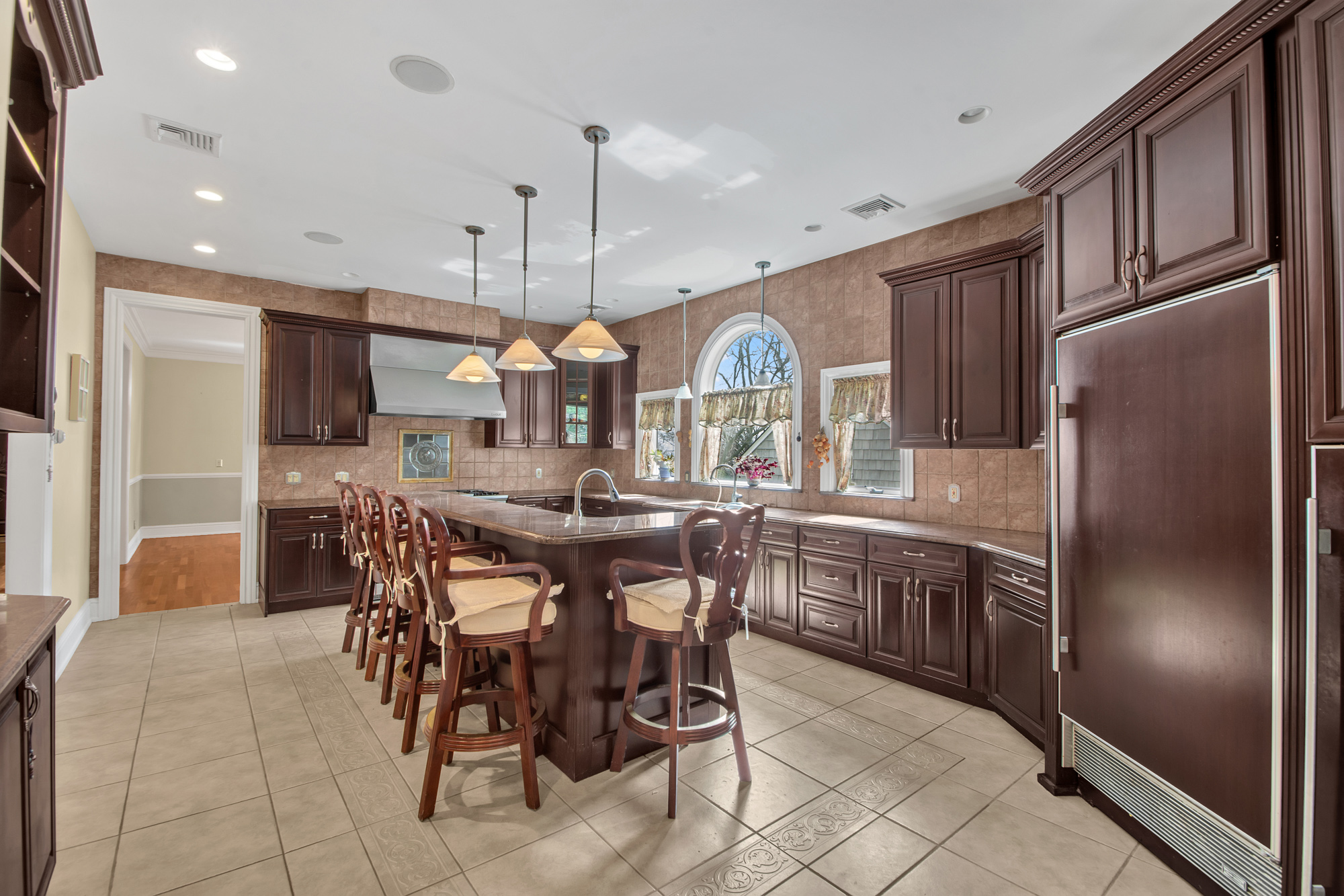 68 Circle Road Staten Island, NY 10304 - Photo 9 of 38 a kitchen with stainless steel appliances granite countertop a stove a sink a refrigerator and a refrigerator