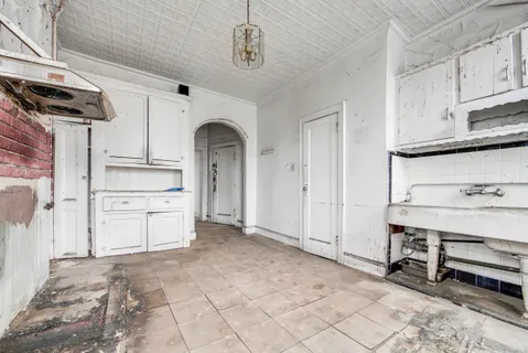 a view of cabinets and wooden floor