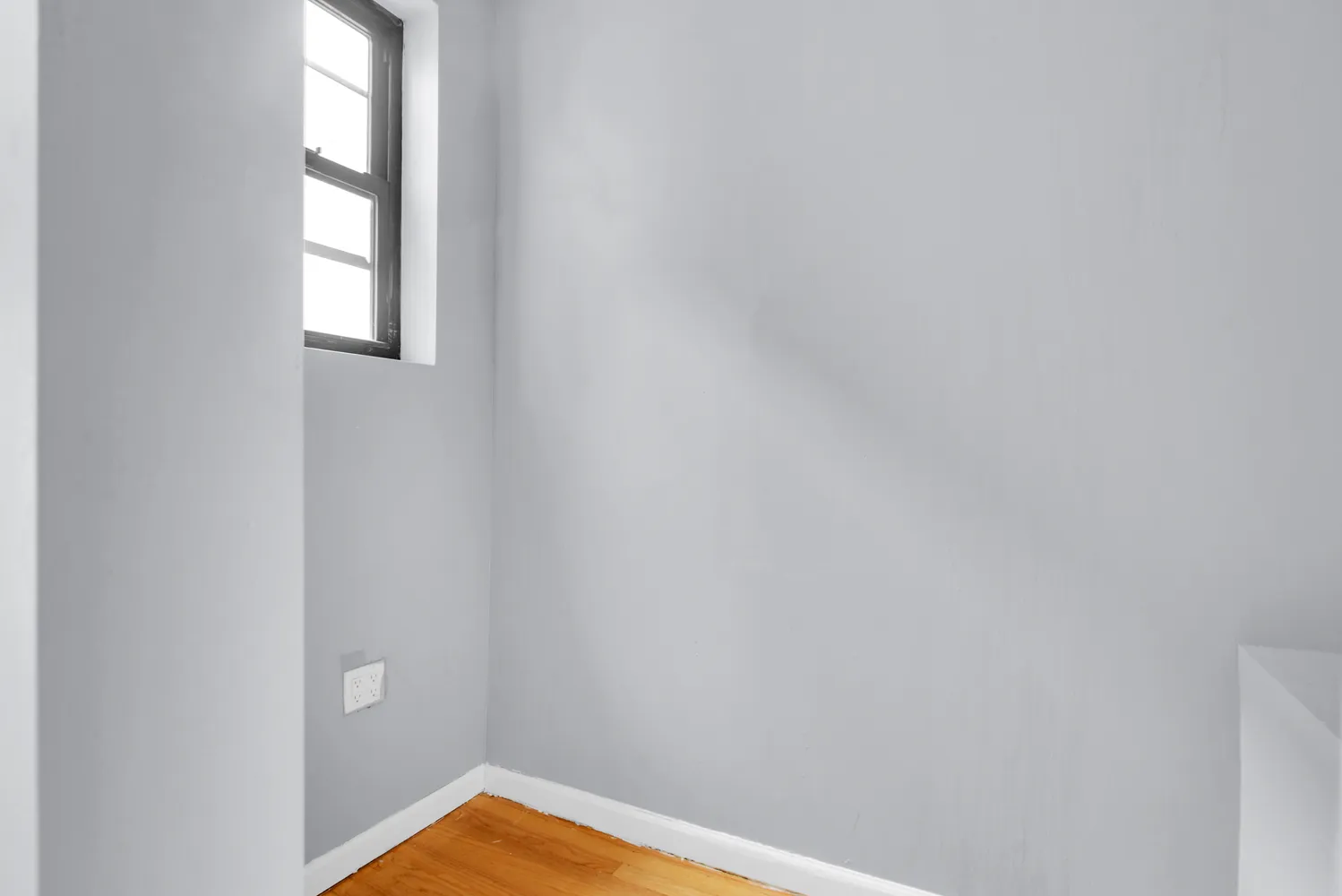 a view of empty room with window