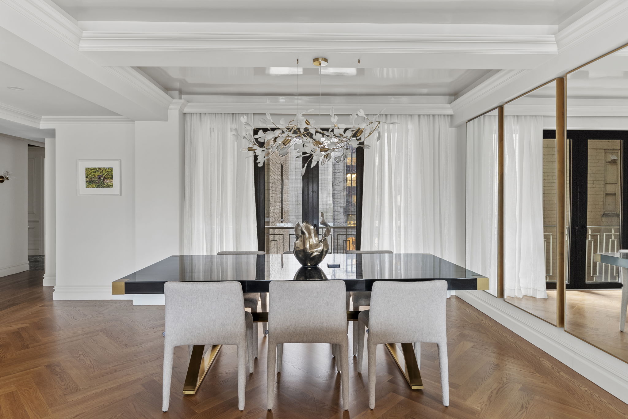 230 Central Park South, Unit 6DE Manhattan, NY 10019 - Photo 6 of 23 a view of a dining room with furniture and window