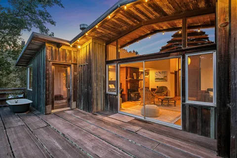 a view of outdoor space with porch and furniture