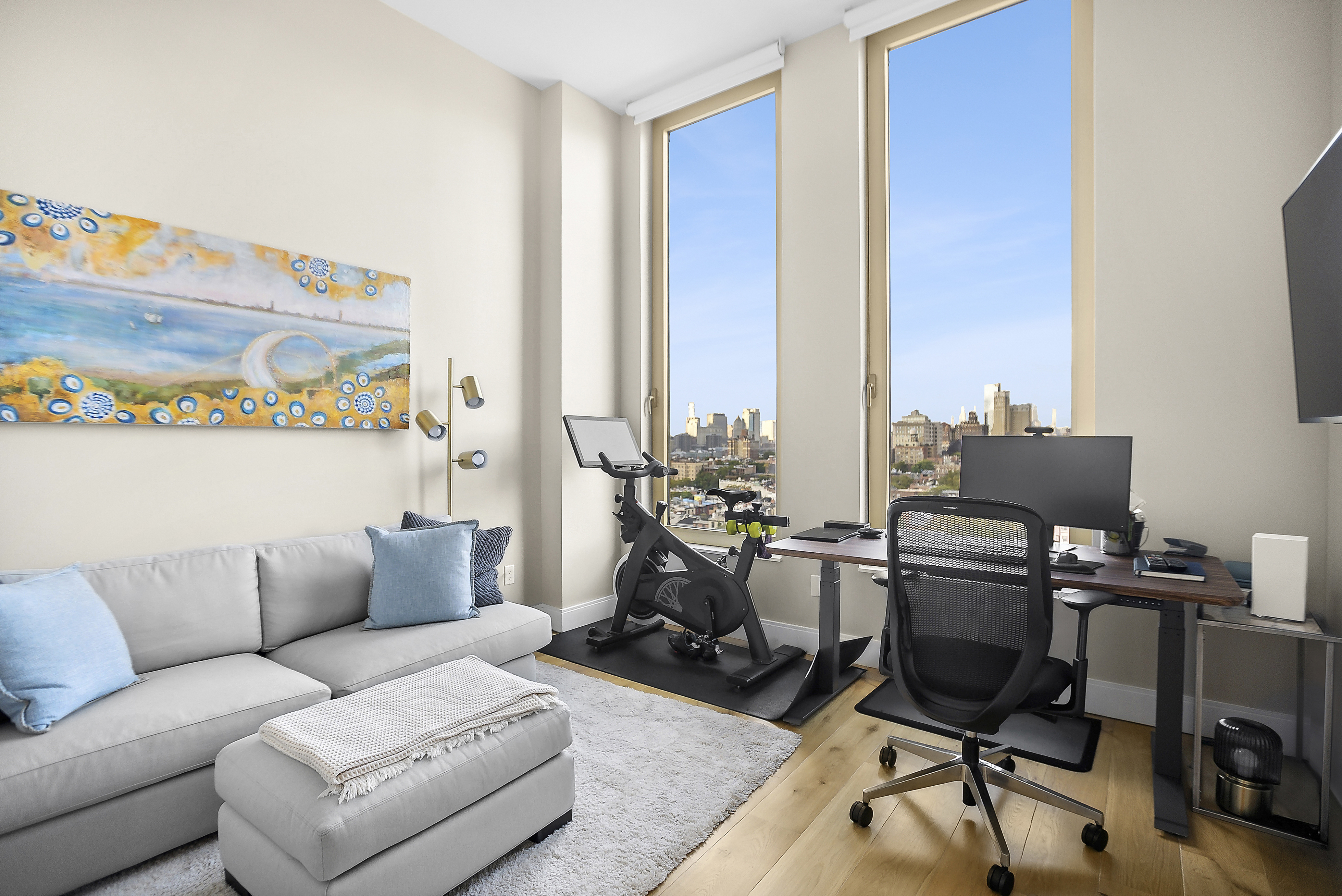 347 Henry Street, Unit 12A Brooklyn, NY 11201 - Photo 9 of 26 a living room with furniture and a floor to ceiling window