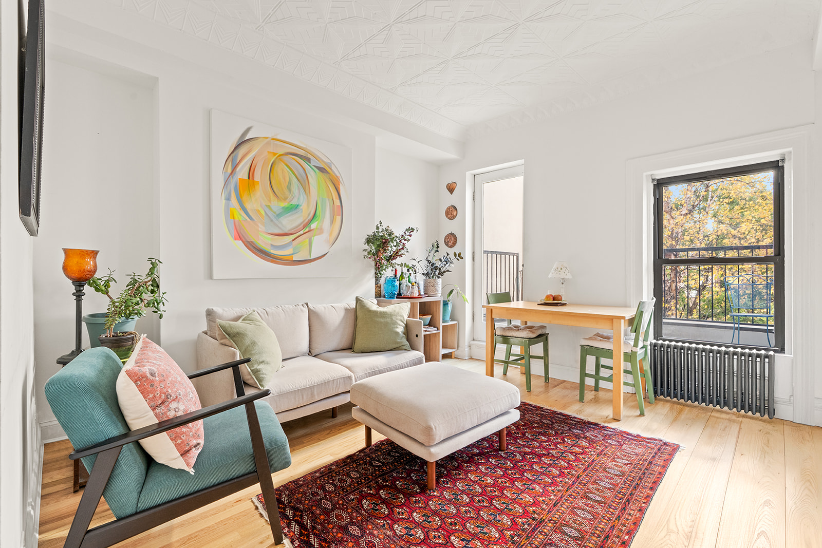12 3rd Street, Unit 2 Brooklyn, NY 11231 - Photo 1 of 7 a living room with furniture and a window