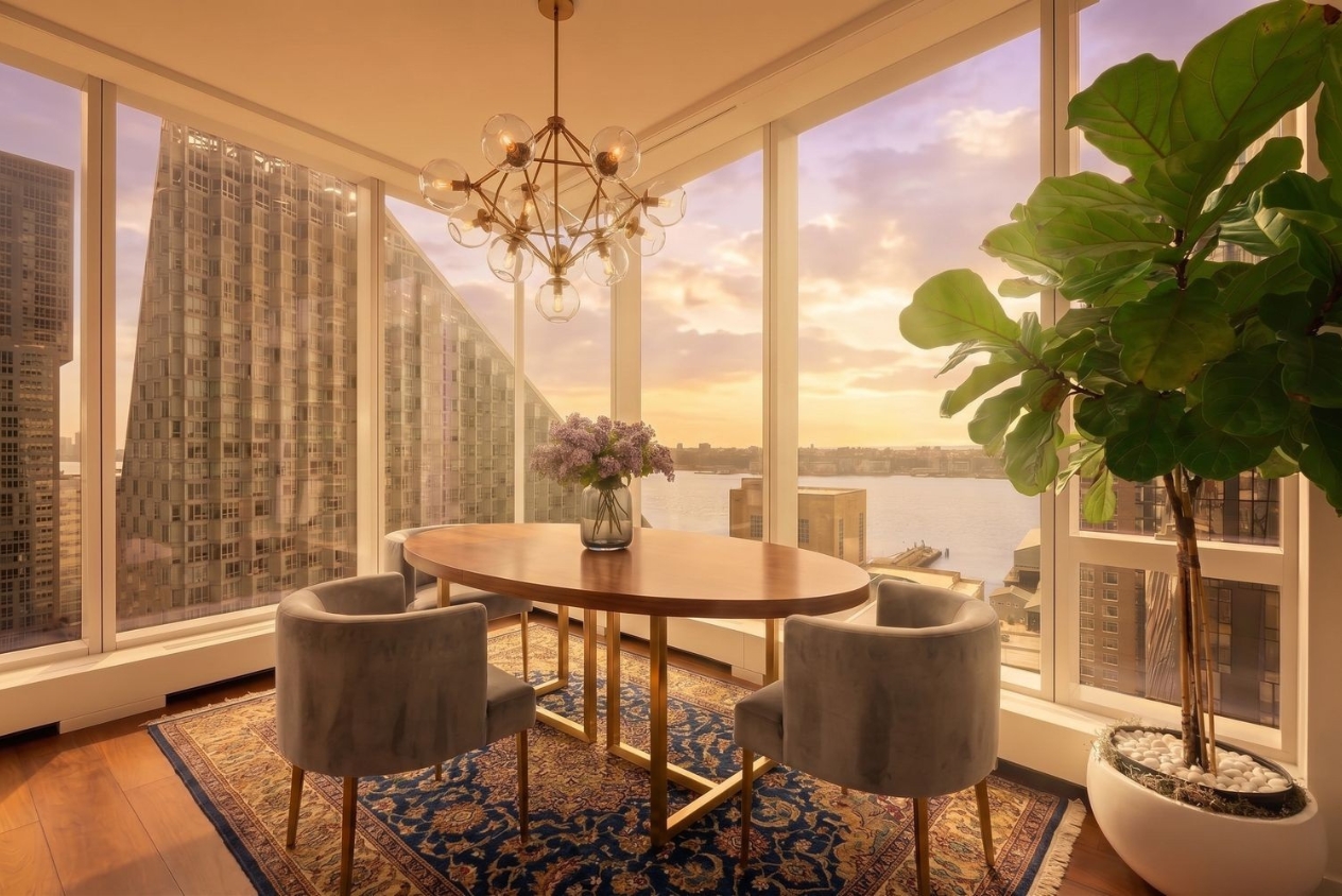 1 West End Avenue, Unit 19J Manhattan, NY 10023 - Photo 2 of 32 a view of a dining room with furniture window and outside view