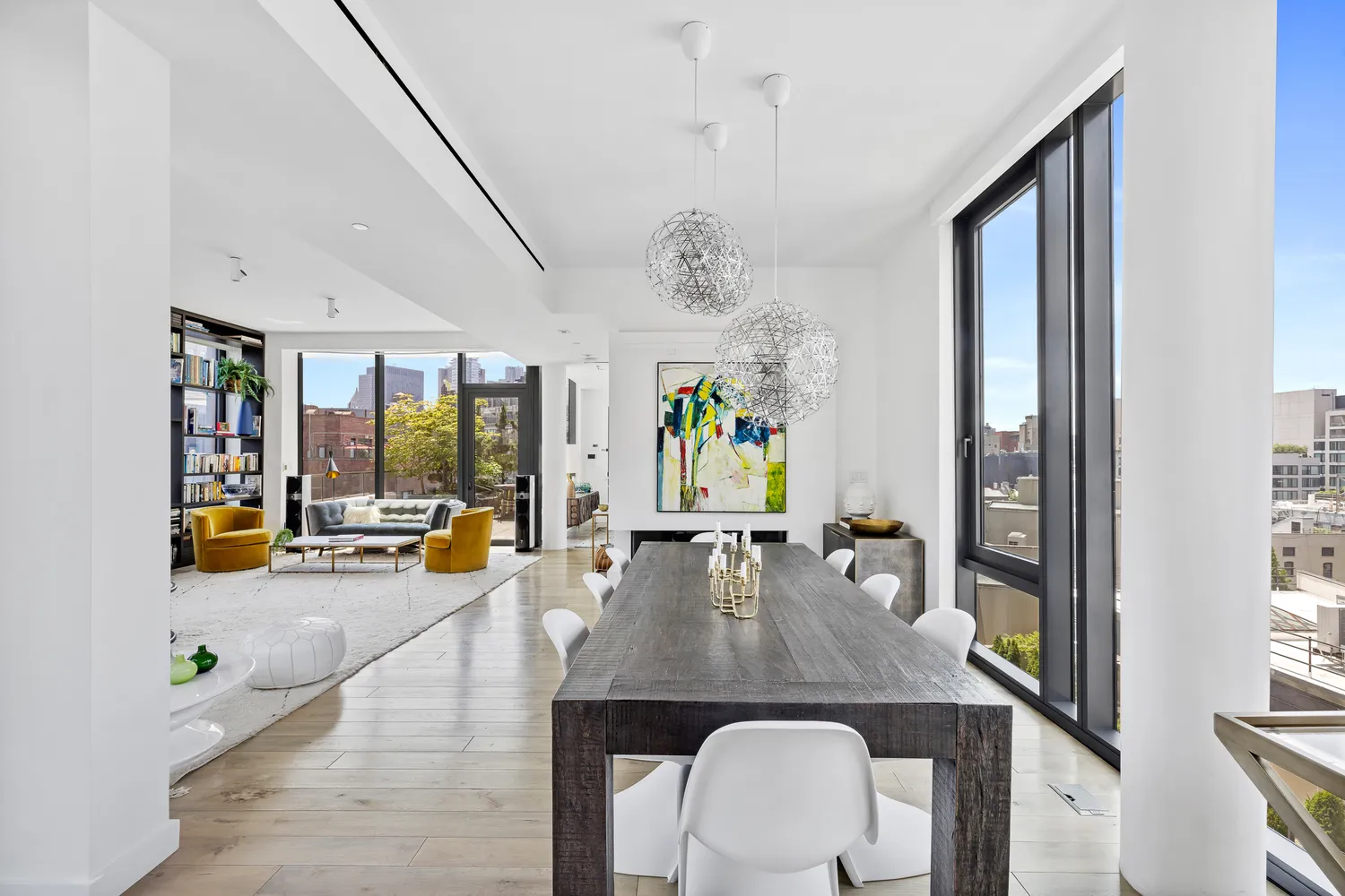 a view of a dining room with furniture and window