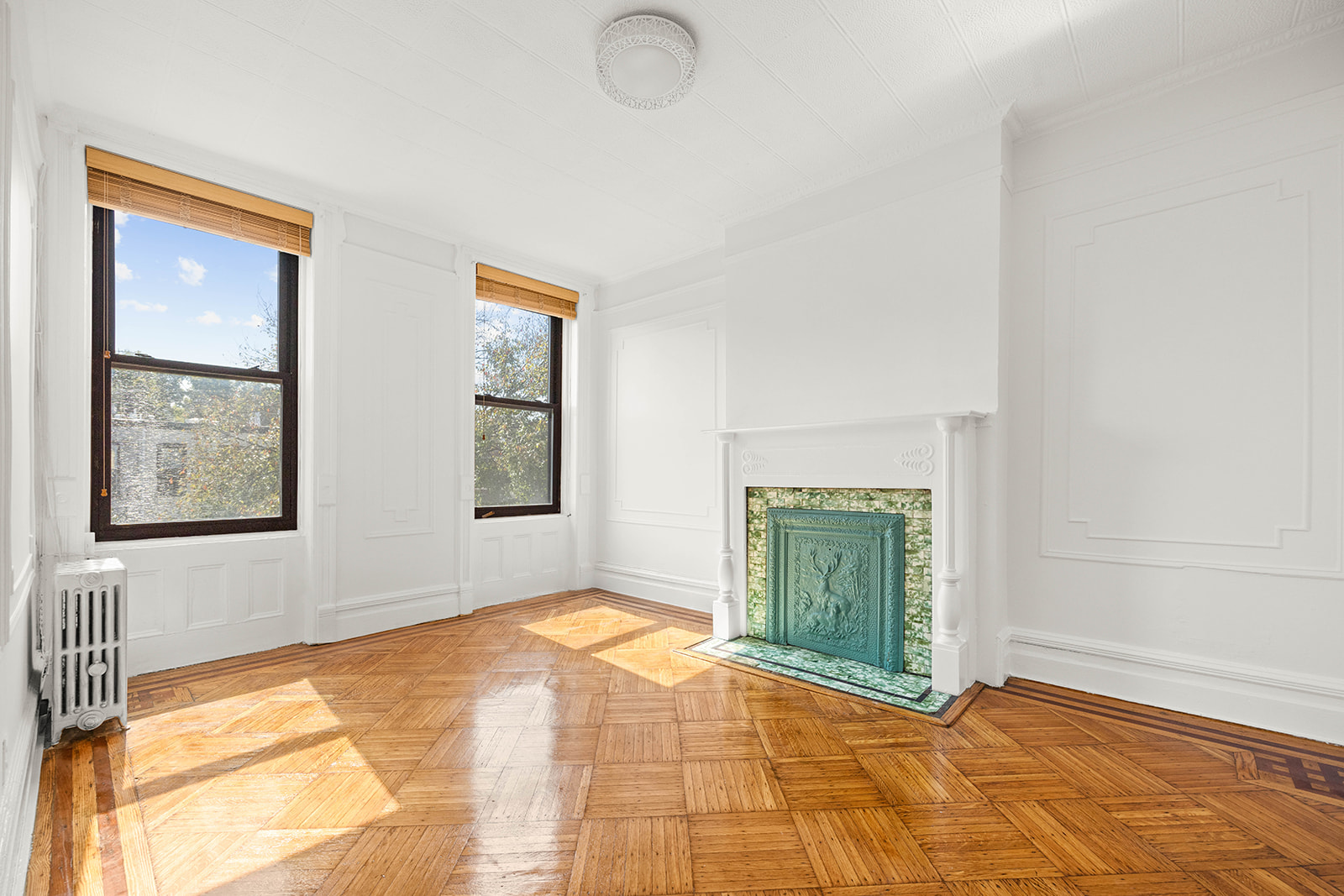 462 13th Street, Unit 2 Brooklyn, NY 11215 - Photo 2 of 7 a view of an empty room with window and cabinet