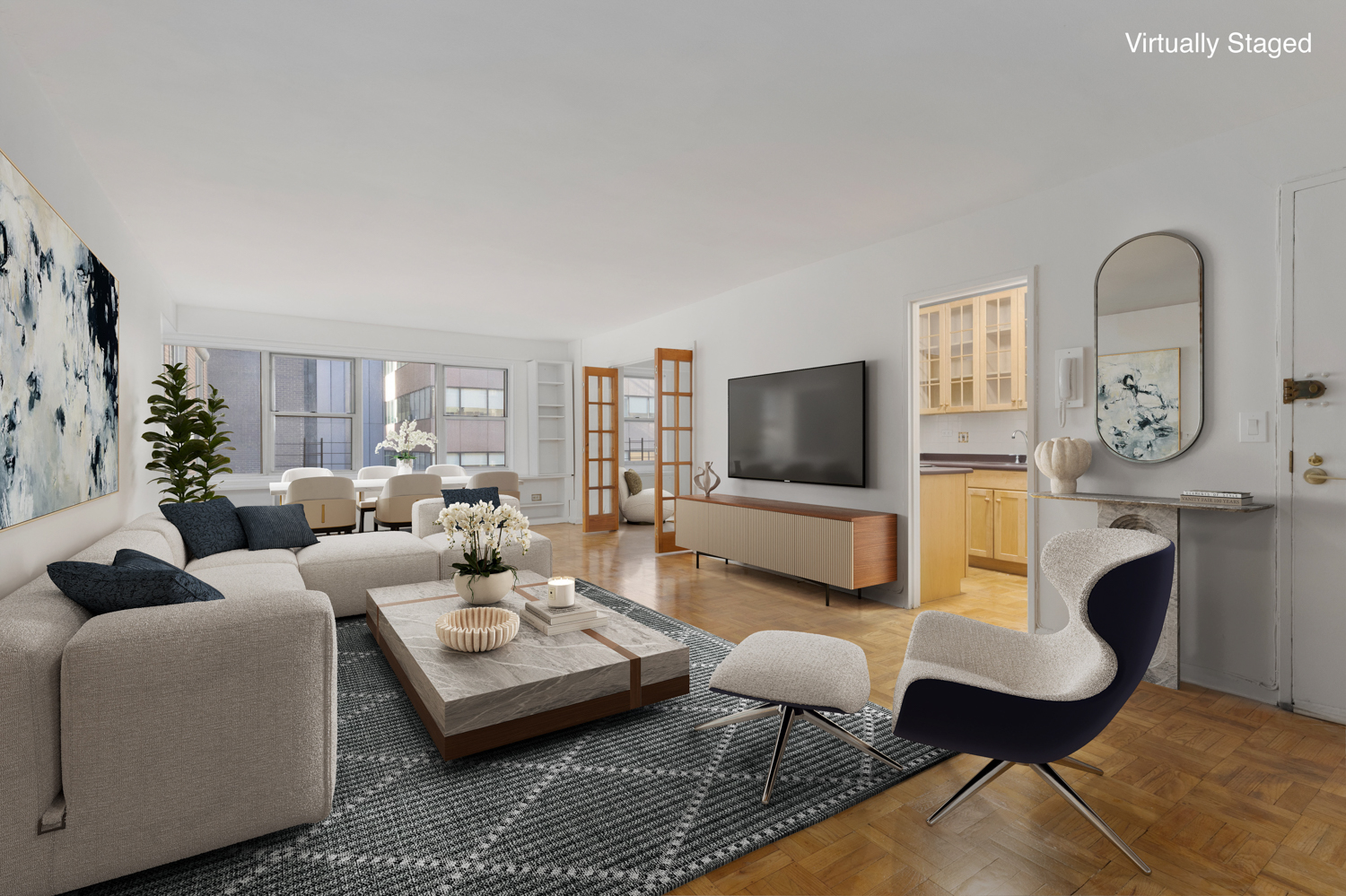 136 East 56th Street, Unit 9J Manhattan, NY 10022 - Photo 2 of 14 a living room with furniture a rug and a flat screen tv