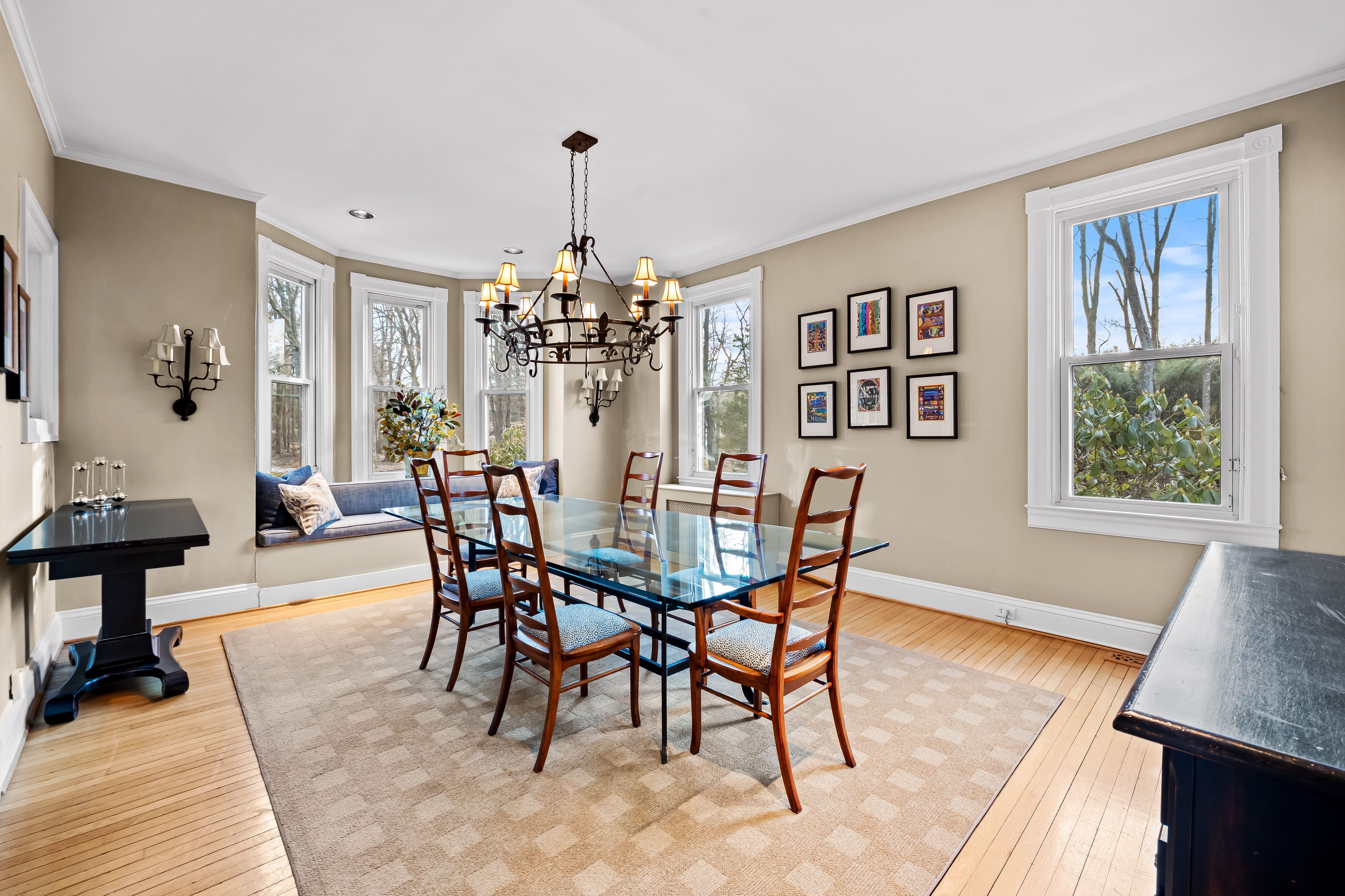 8412 Stevenson Road Pikesville, MD 21208 - Photo 23 of 81 a view of a dining room with furniture a chandelier and wooden floor