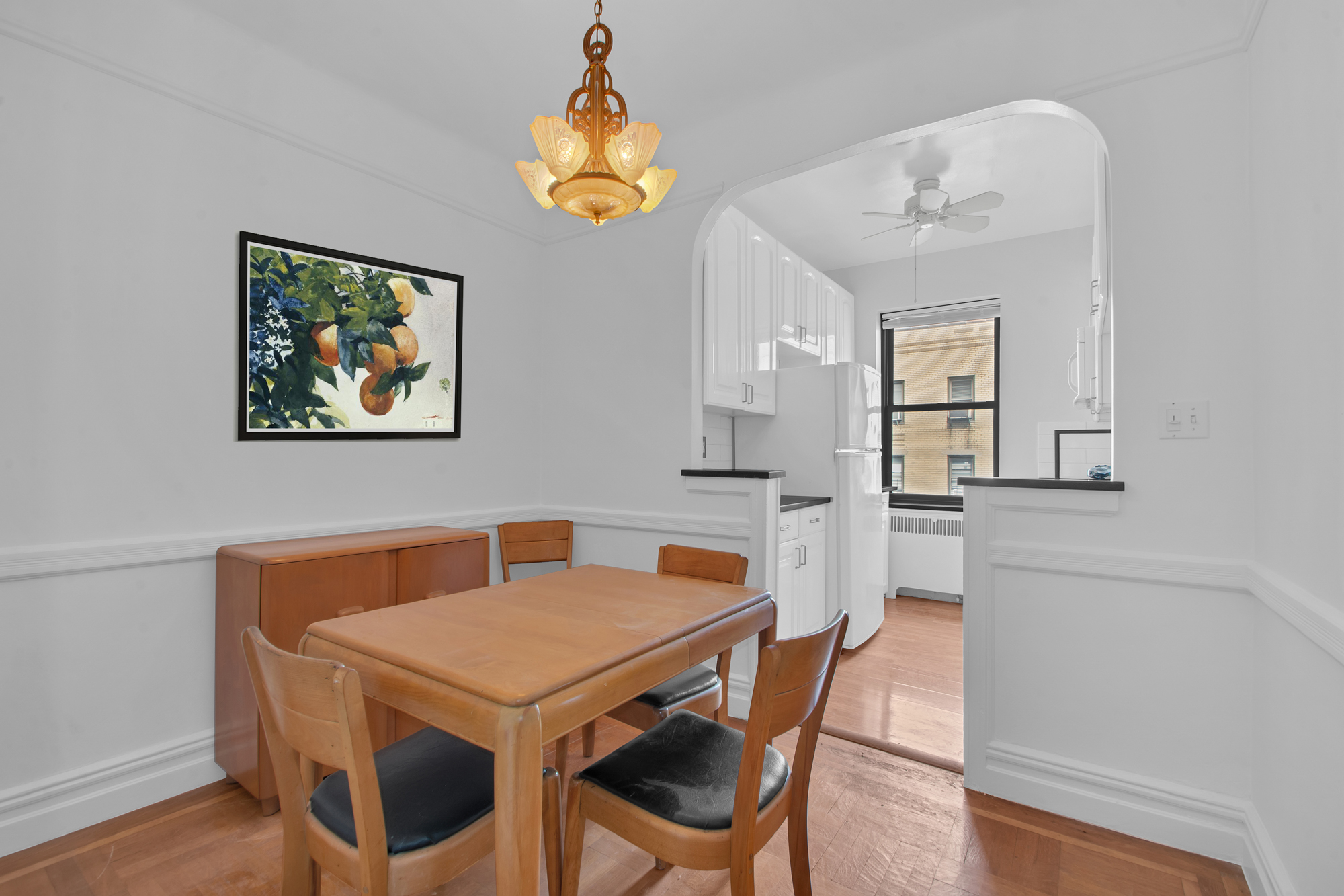 200 Pinehurst Avenue, Unit 5C Manhattan, NY 10033 - Photo 8 of 17 a view of a dining room with furniture