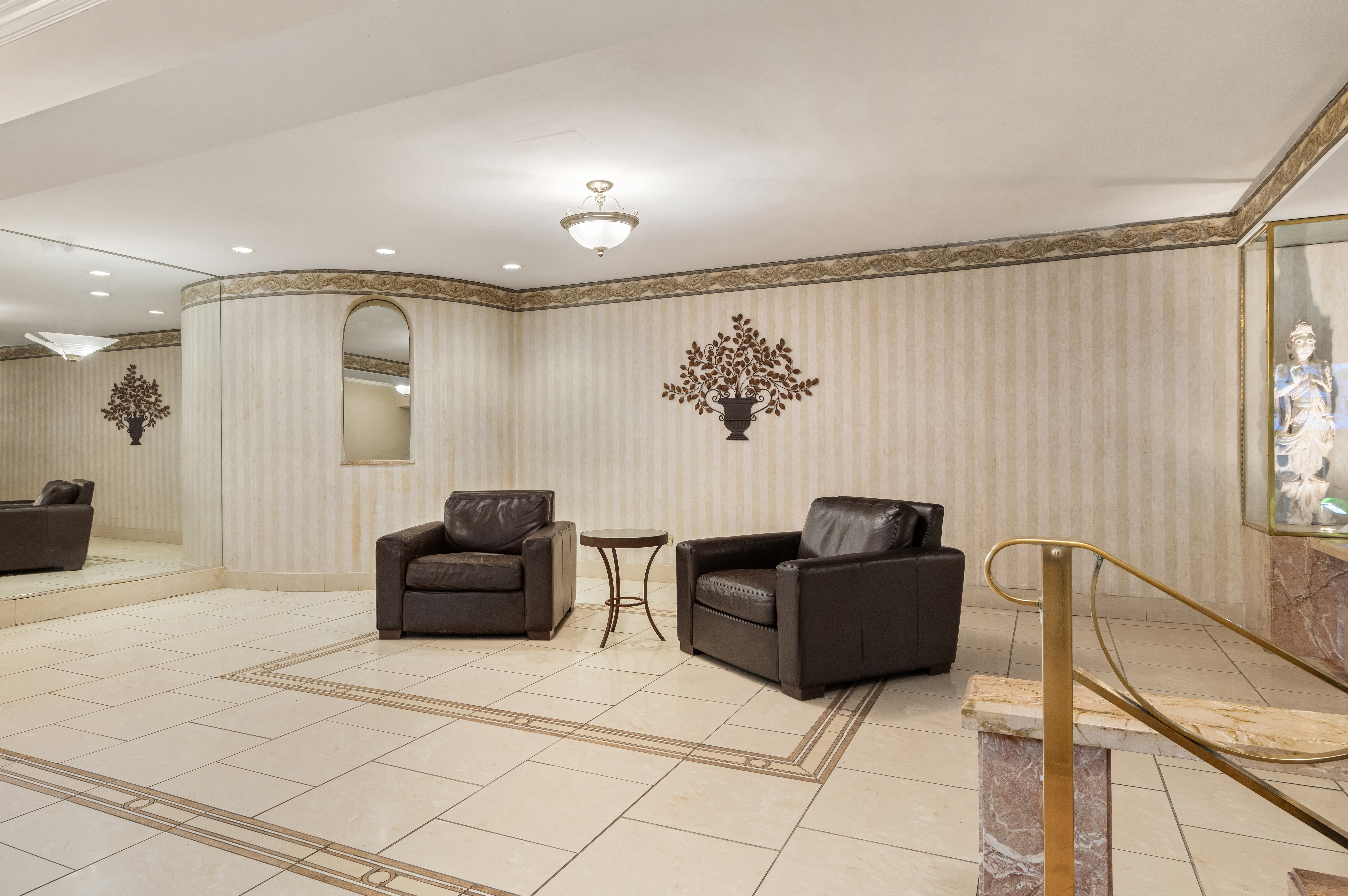 68-61 Yellowstone Boulevard, Unit 618 Queens, NY 11375 - Photo 11 of 13 a living room with furniture and a flat screen tv