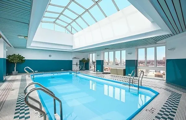 a kitchen with stainless steel appliances granite countertop a sink and cabinets