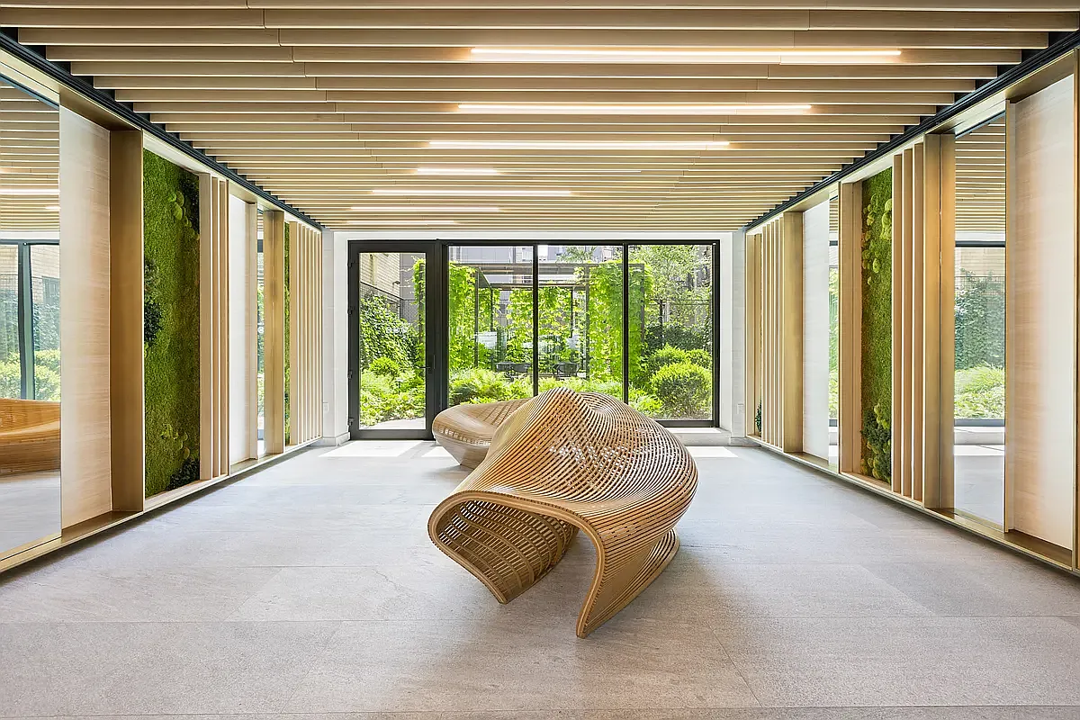 85 4th Avenue, Unit 5MM Manhattan, NY 10003 - Photo 3 of 6 a living room with furniture and floor to ceiling windows