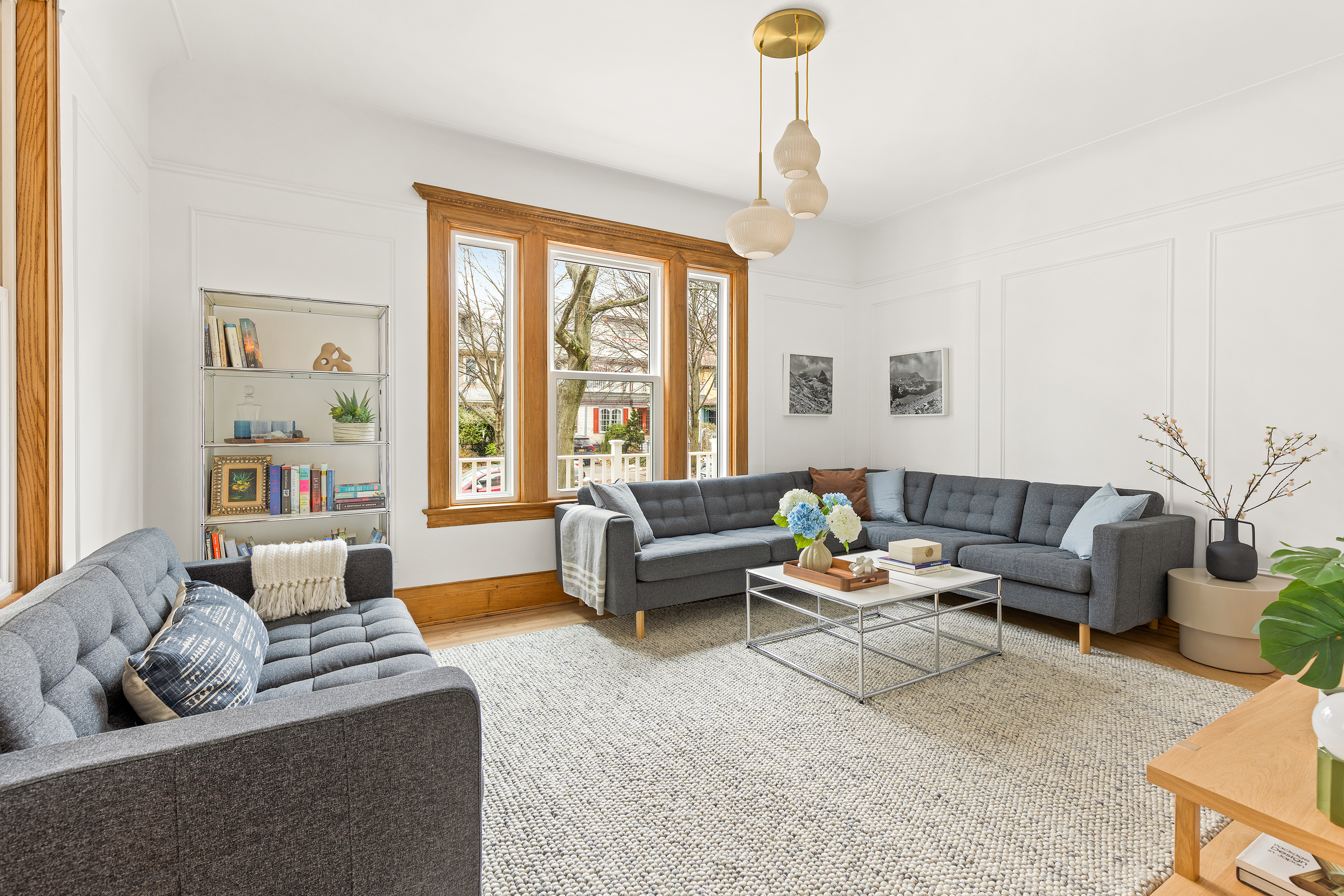 467 Rugby Road Brooklyn, NY 11226 - Photo 7 of 22 a living room with furniture and a large window