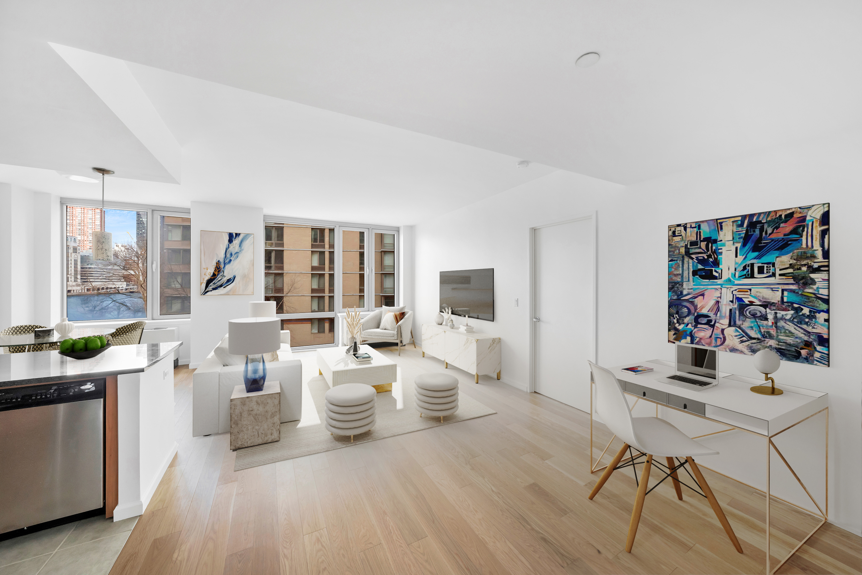 455 Main Street, Unit 5K Manhattan, NY 10044 - Photo 3 of 12 a living room with furniture and a table