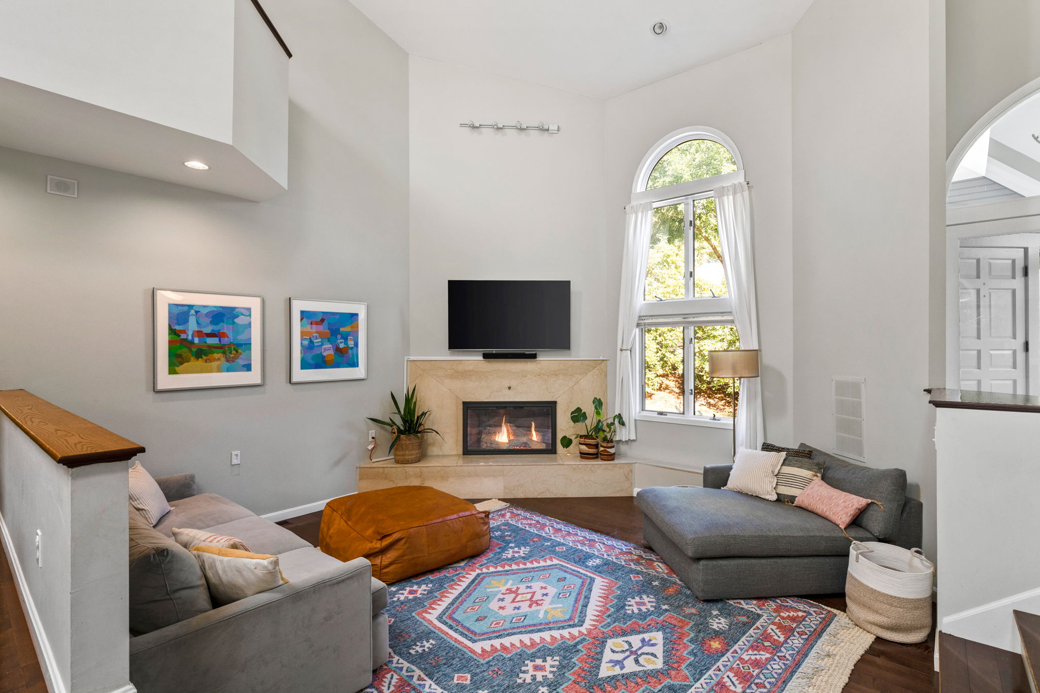33 Thoreau Circle Beverly, MA 01915 - Photo 2 of 20 a living room with furniture a fireplace and a flat screen tv