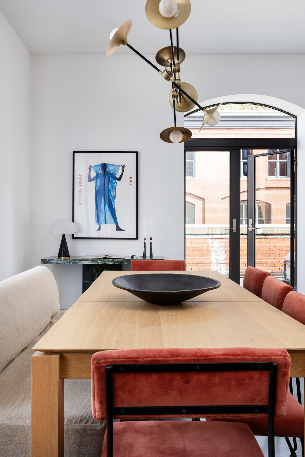 92 Laight Street, Unit PHC Manhattan, NY 10013 - Photo 6 of 16 a view of a dining room with furniture window and wooden floor