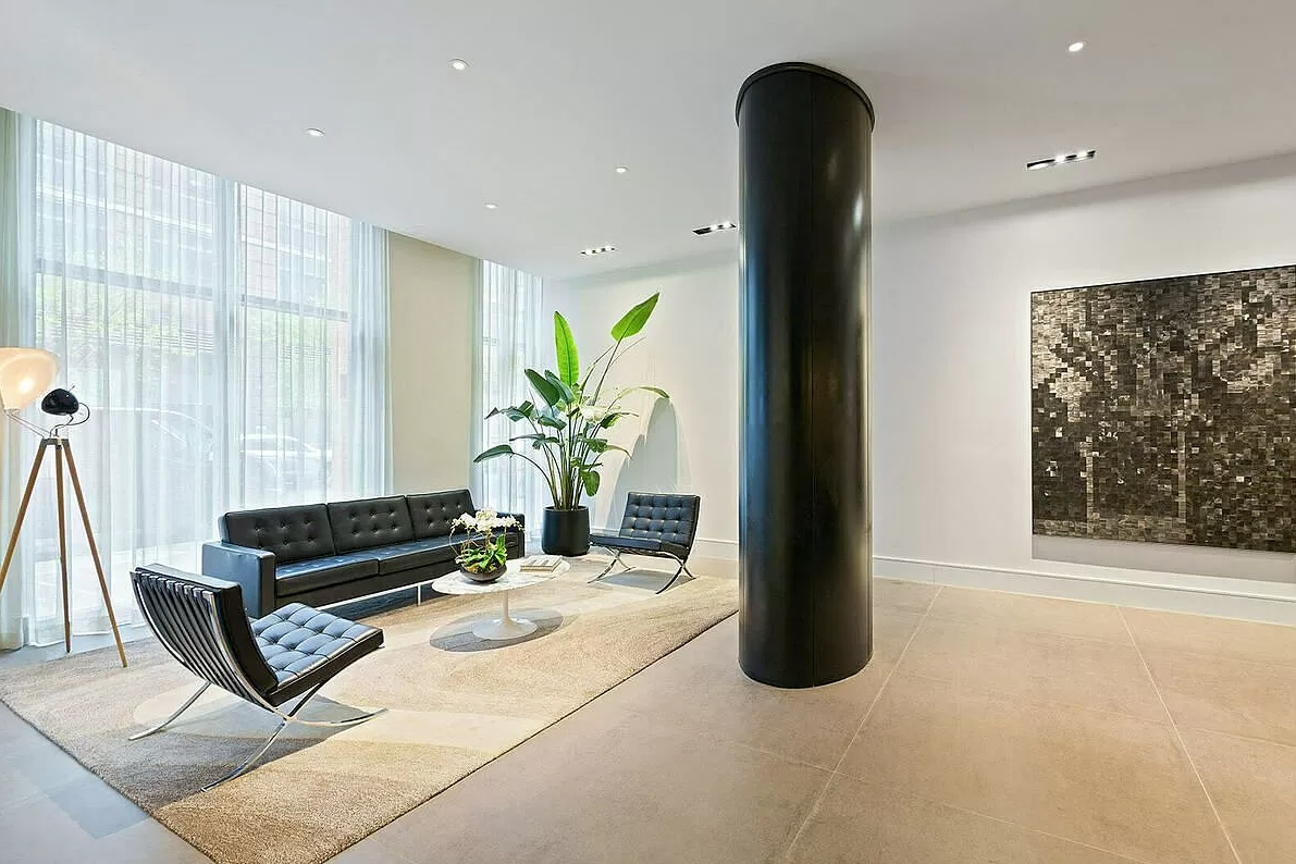 540 West 28th Street, Unit 4F Manhattan, NY 10001 - Photo 11 of 16 a living room with furniture and a potted plant