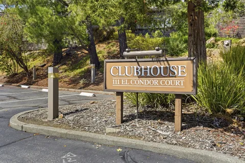 a sign broad on the side of the road