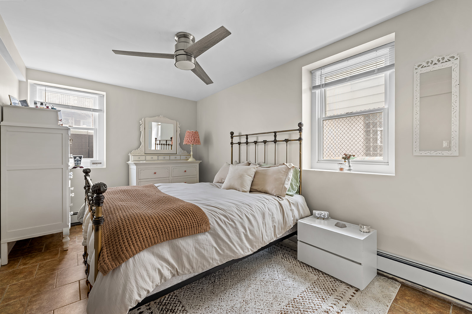 524 Beach 127th Street Queens, NY 11694 - Photo 12 of 18 a bedroom with a bed and a window