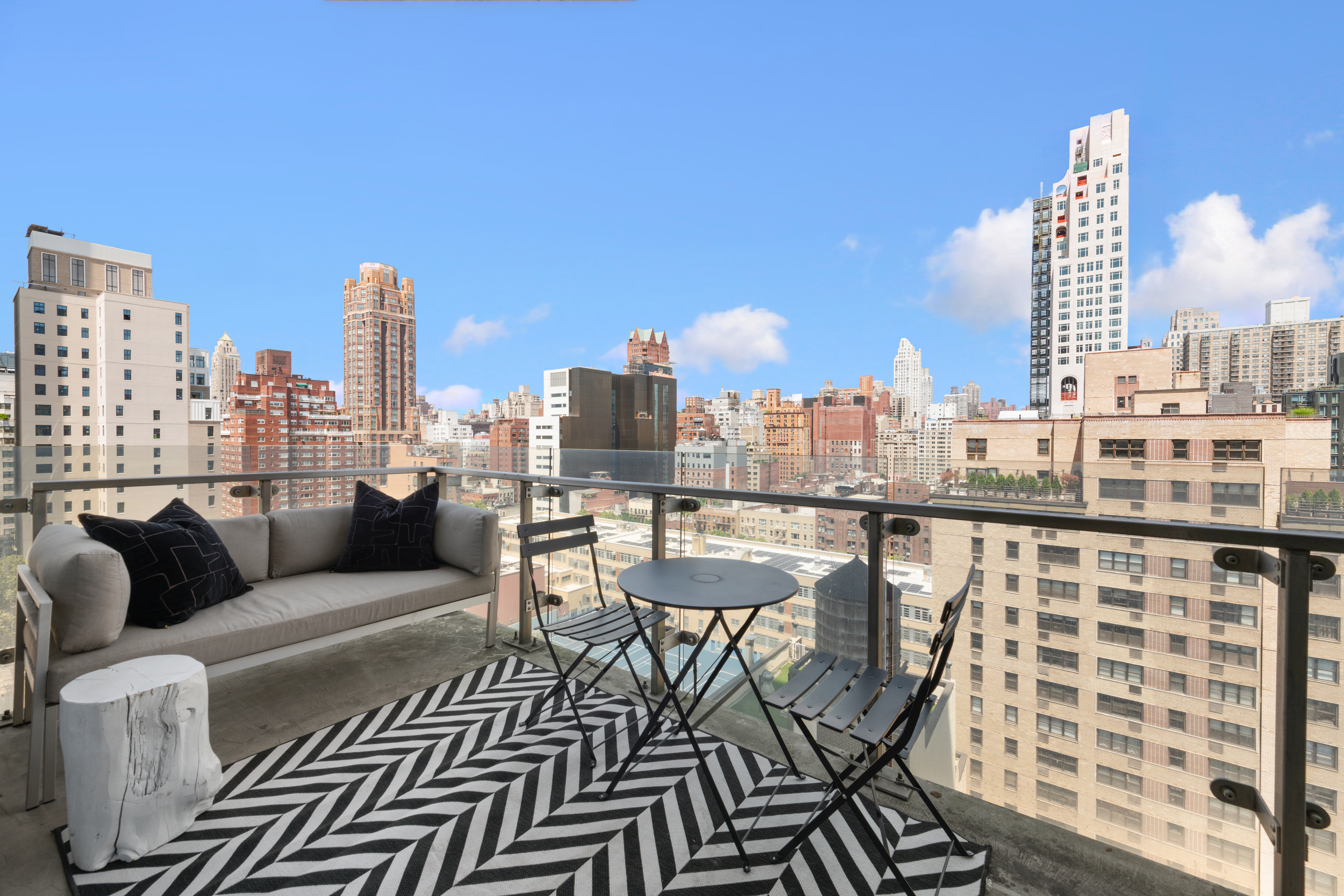 255 East 74th Street, Unit 14C Manhattan, NY 10021 - Photo 9 of 14 a view of a city with tall buildings