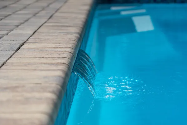 a front view of a house with swimming pool