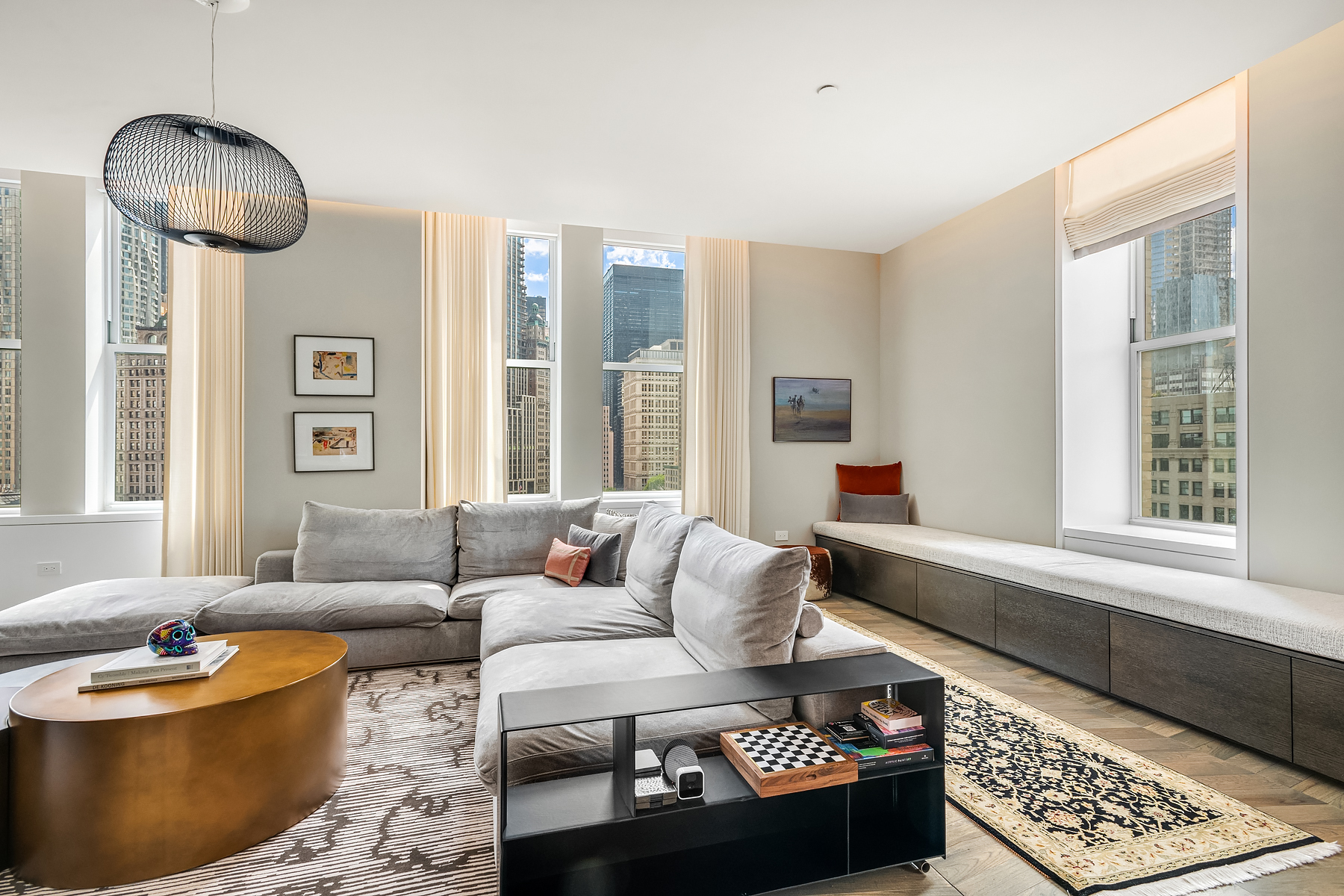49 Chambers Street, Unit 11D Manhattan, NY 10007 - Photo 3 of 30 a living room with furniture and a window
