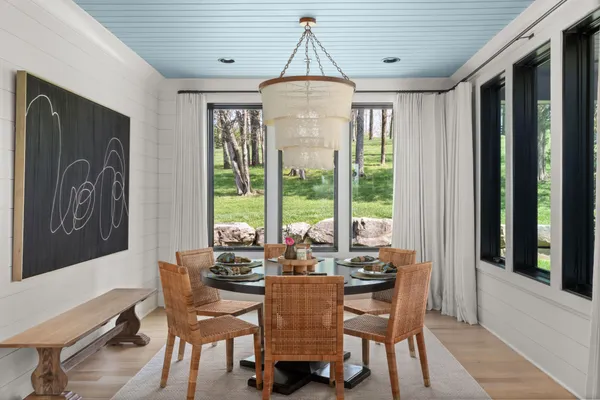 a room with furniture and a chandelier