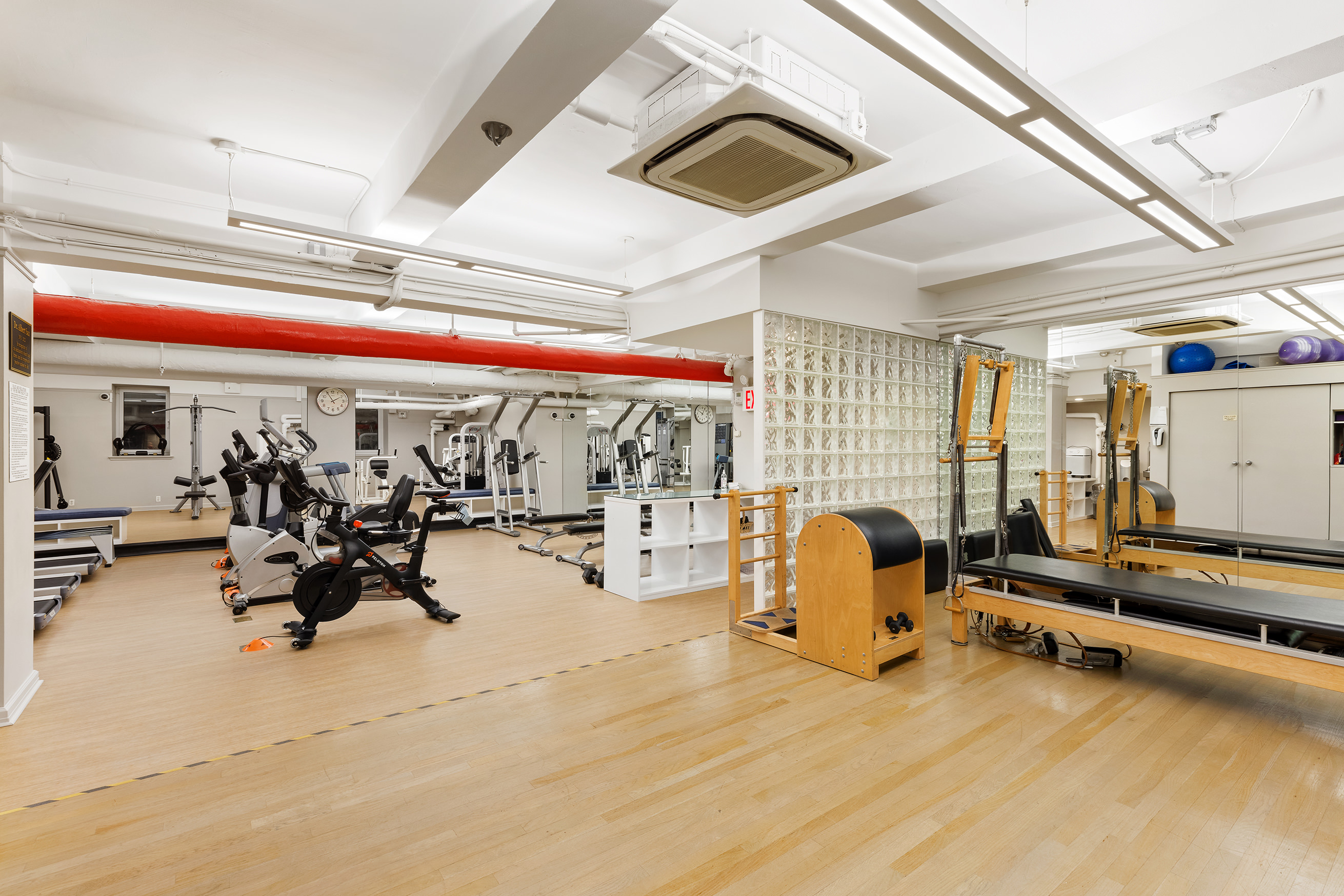 1100 Park Avenue, Unit 14B Manhattan, NY 10128 - Photo 11 of 14 a view of a room with gym equipment