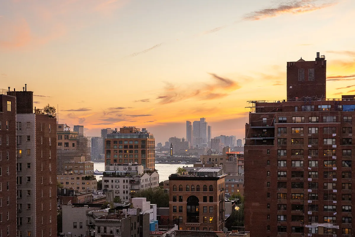 31 Jane Street, Unit 16G Manhattan, NY 10014 - Photo 6 of 20 a view of a city with tall buildings