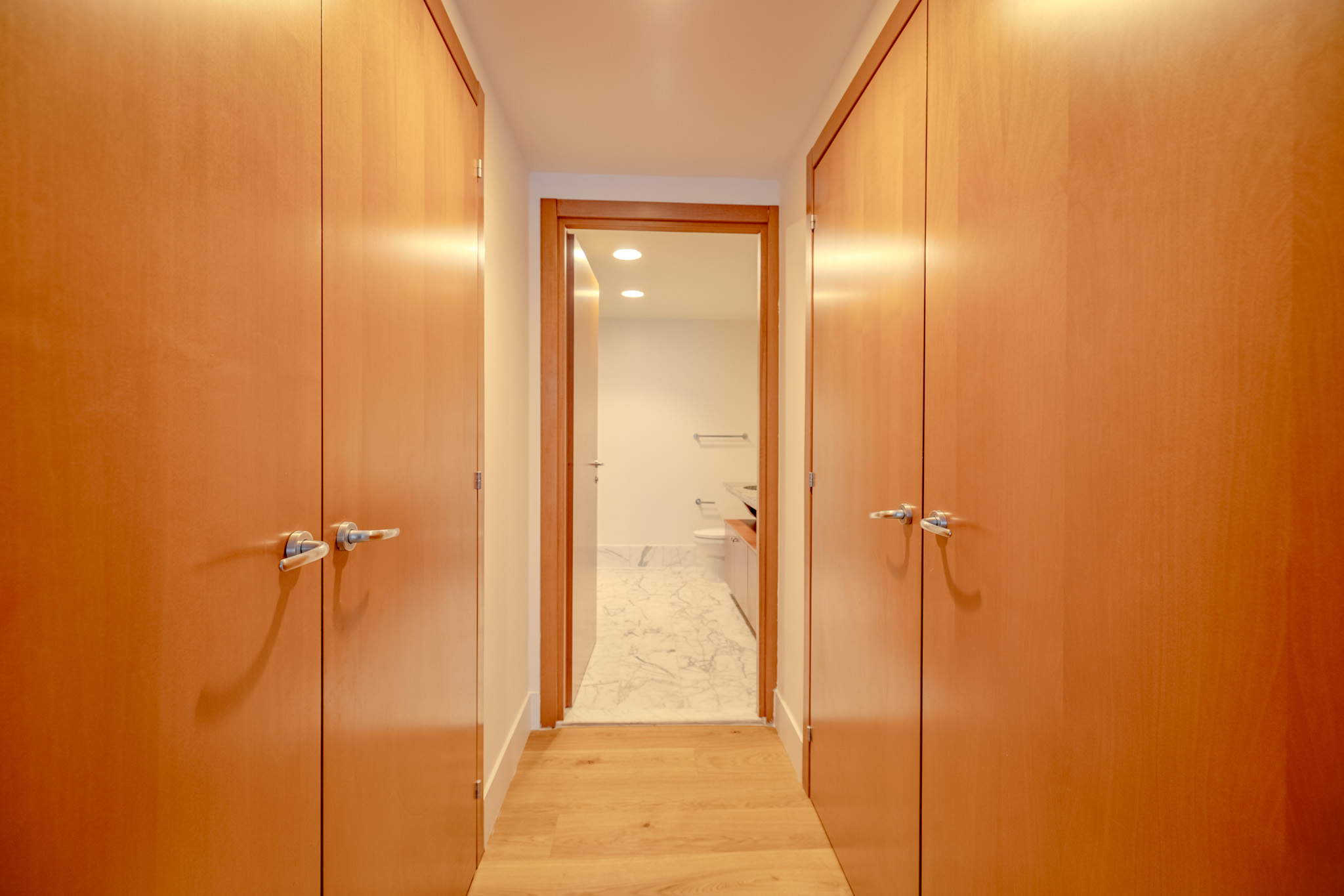 446 Kent Avenue, Unit PHC Brooklyn, NY 11249 - Photo 10 of 22 a bathroom with a glass shower door