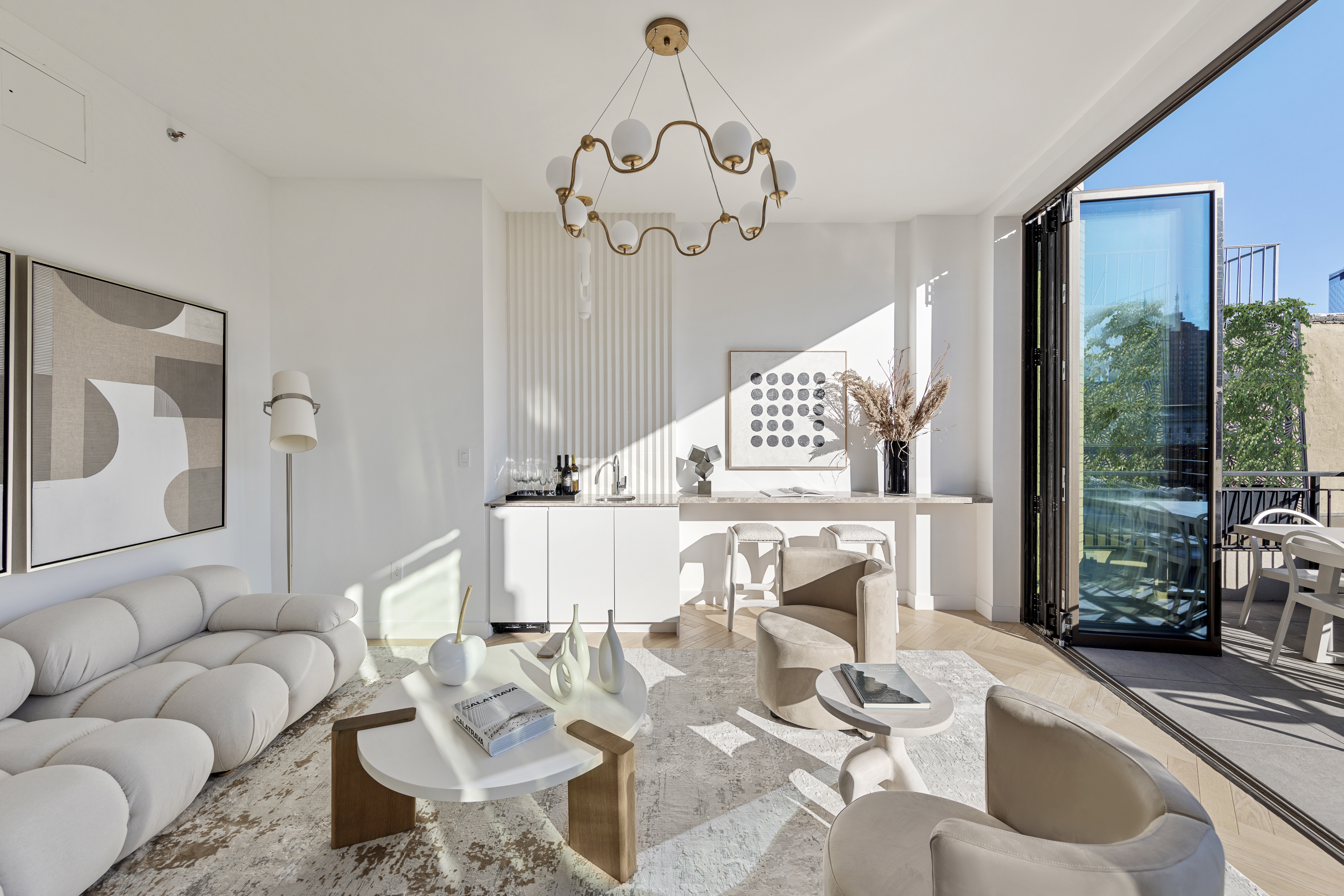 378 Broome Street, Unit PH Manhattan, NY 10013 - Photo 6 of 25 a living room with furniture a fireplace and a chandelier