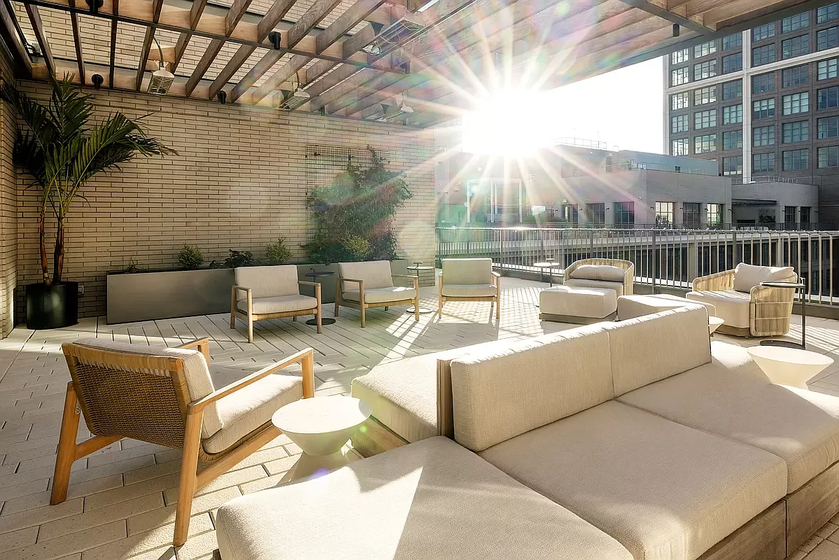 180 Front Street, Unit 7B Brooklyn, NY 11201 - Photo 18 of 25 a view of a patio with couches table and chairs and potted plants