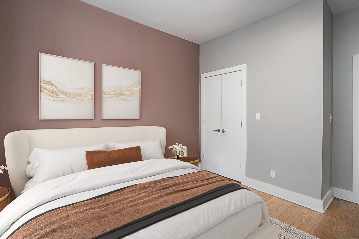 a bedroom with a large bed and a window